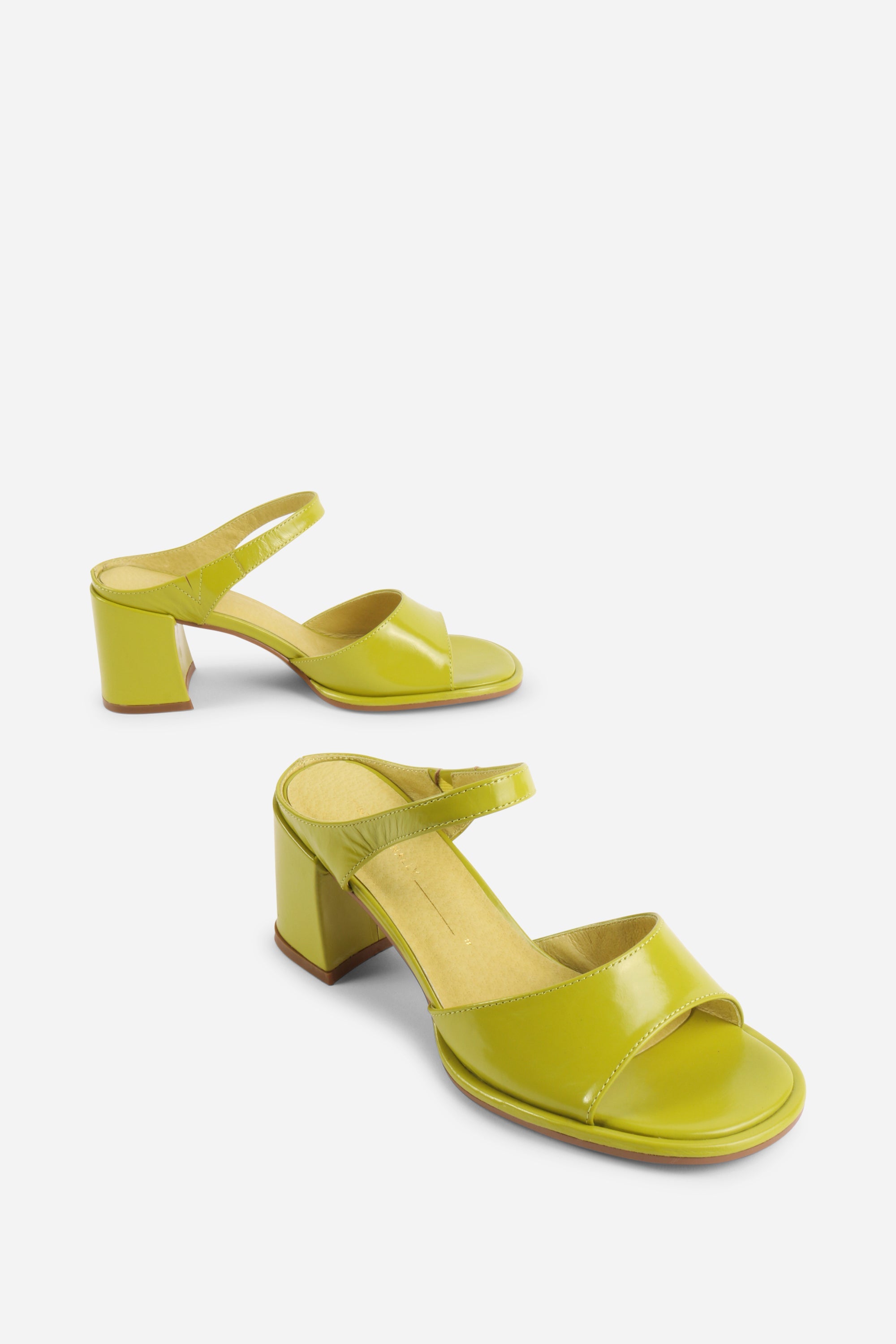 "INTENTIONALLY __________." Apex Block Heel Sandal