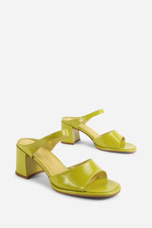 "INTENTIONALLY __________." Apex Block Heel Sandal