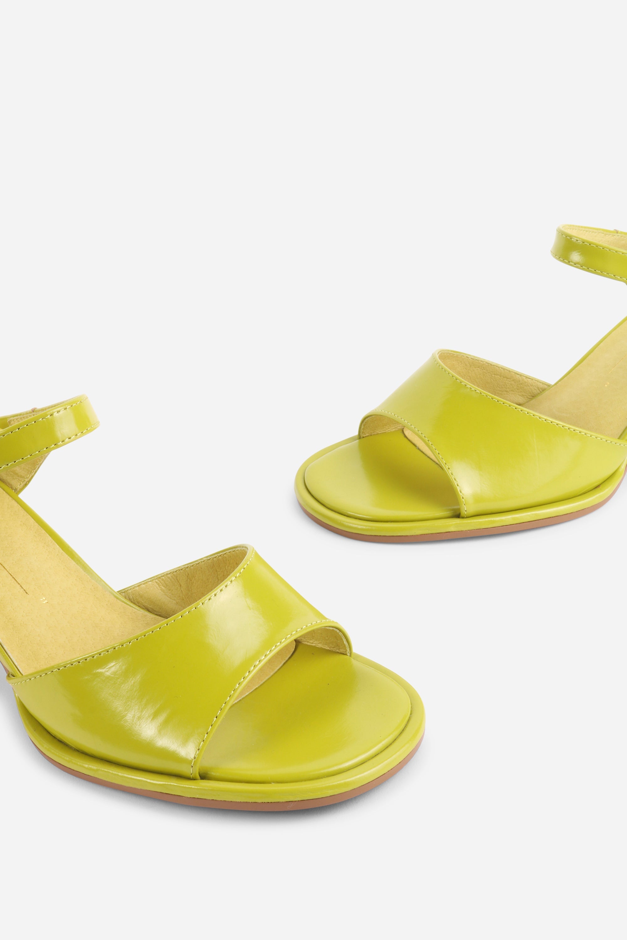 "INTENTIONALLY __________." Apex Block Heel Sandal