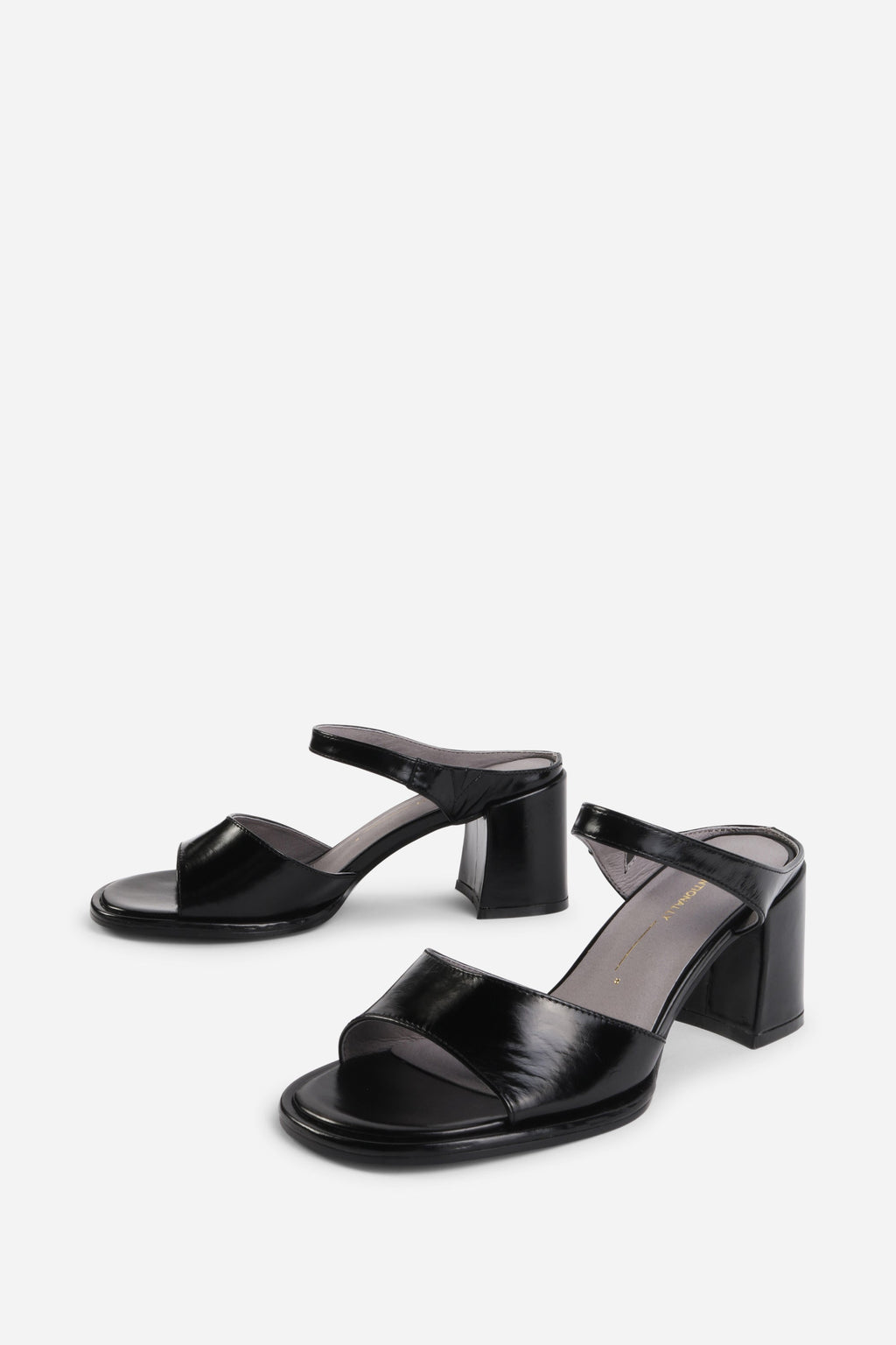 "INTENTIONALLY __________." Apex Block Heel Sandal