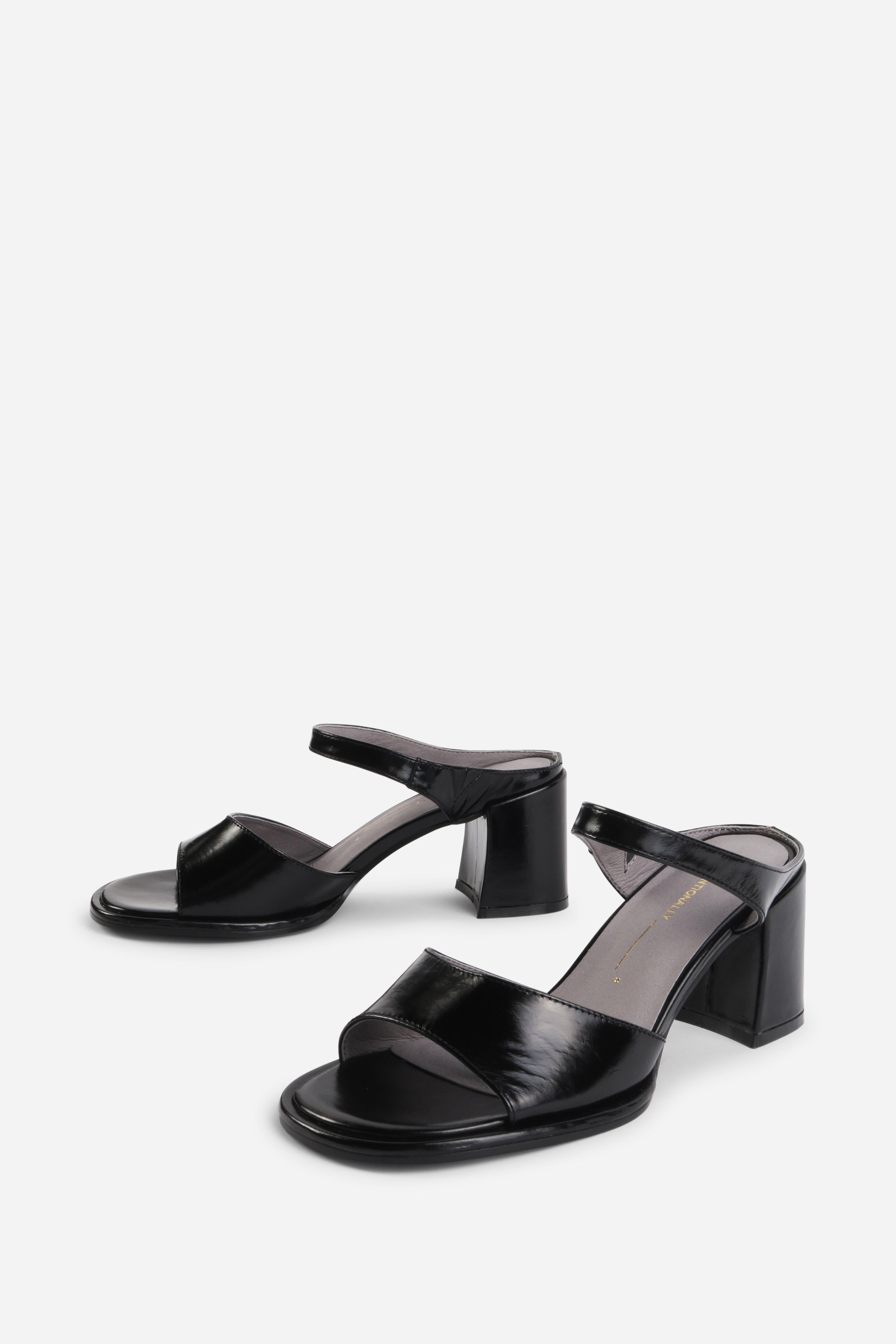 "INTENTIONALLY __________." Apex Block Heel Sandal