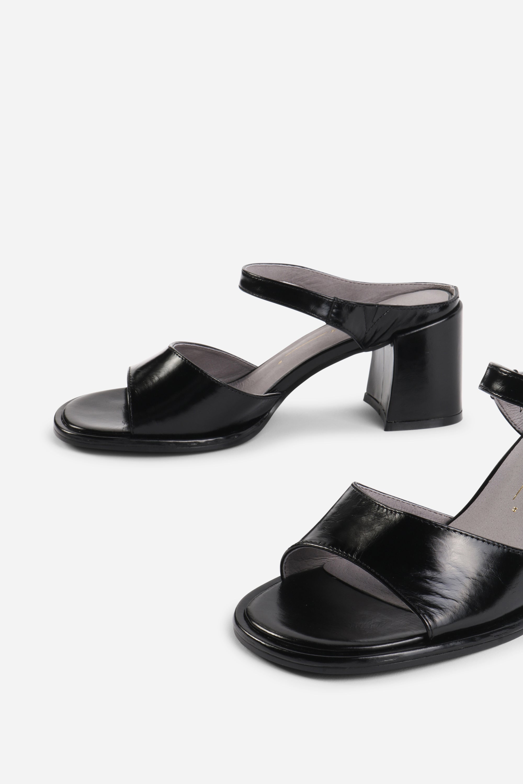 "INTENTIONALLY __________." Apex Block Heel Sandal