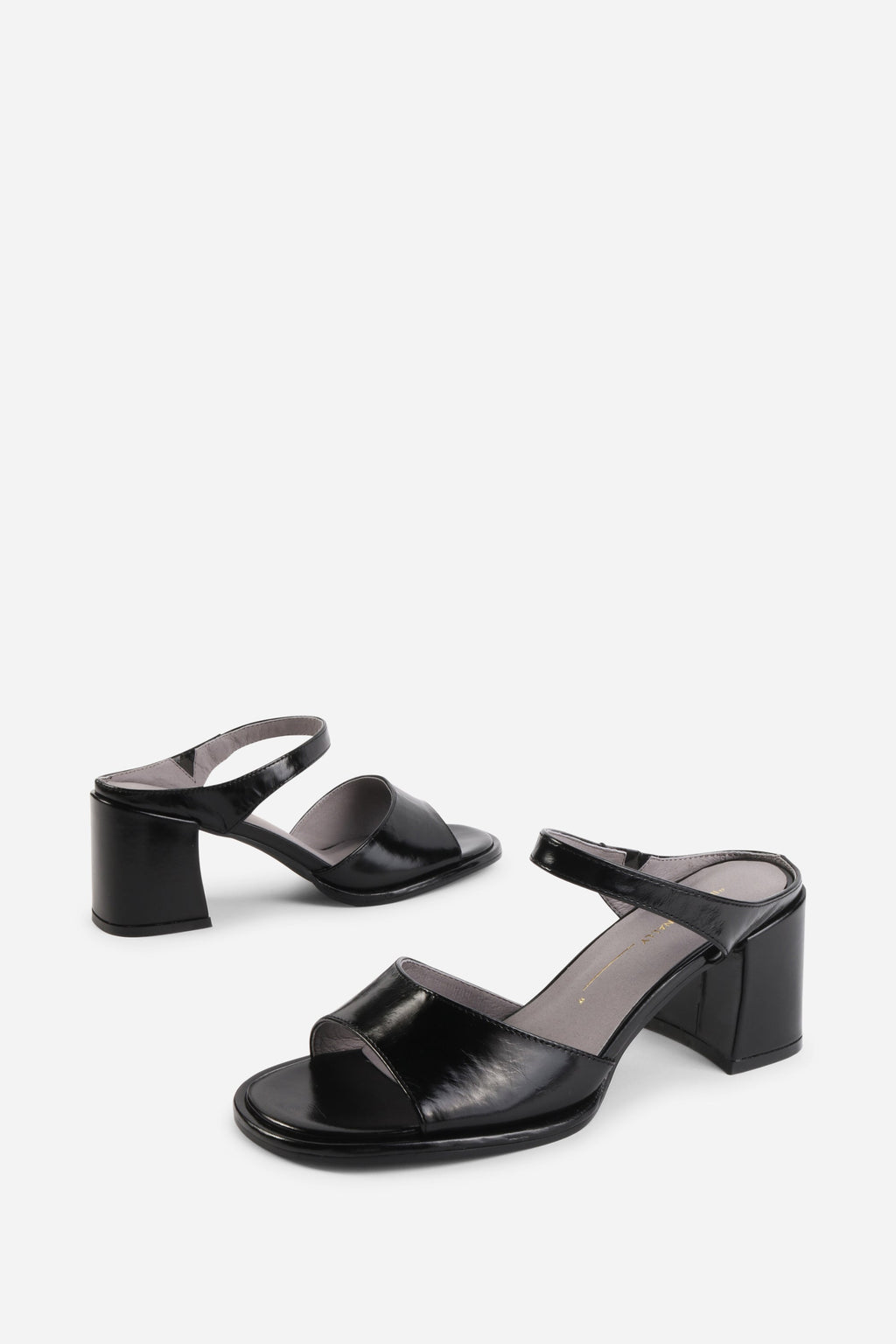 "INTENTIONALLY __________." Apex Block Heel Sandal