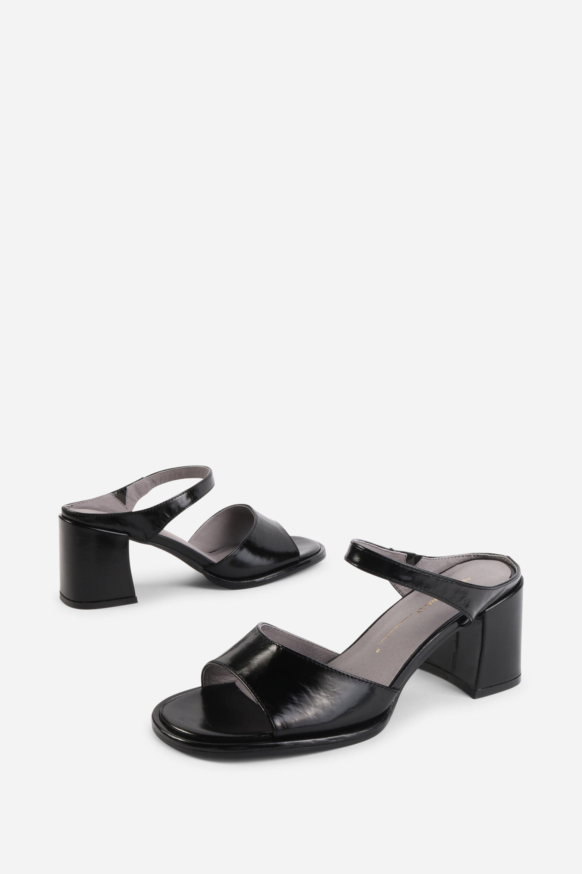 "INTENTIONALLY __________." Apex Block Heel Sandal