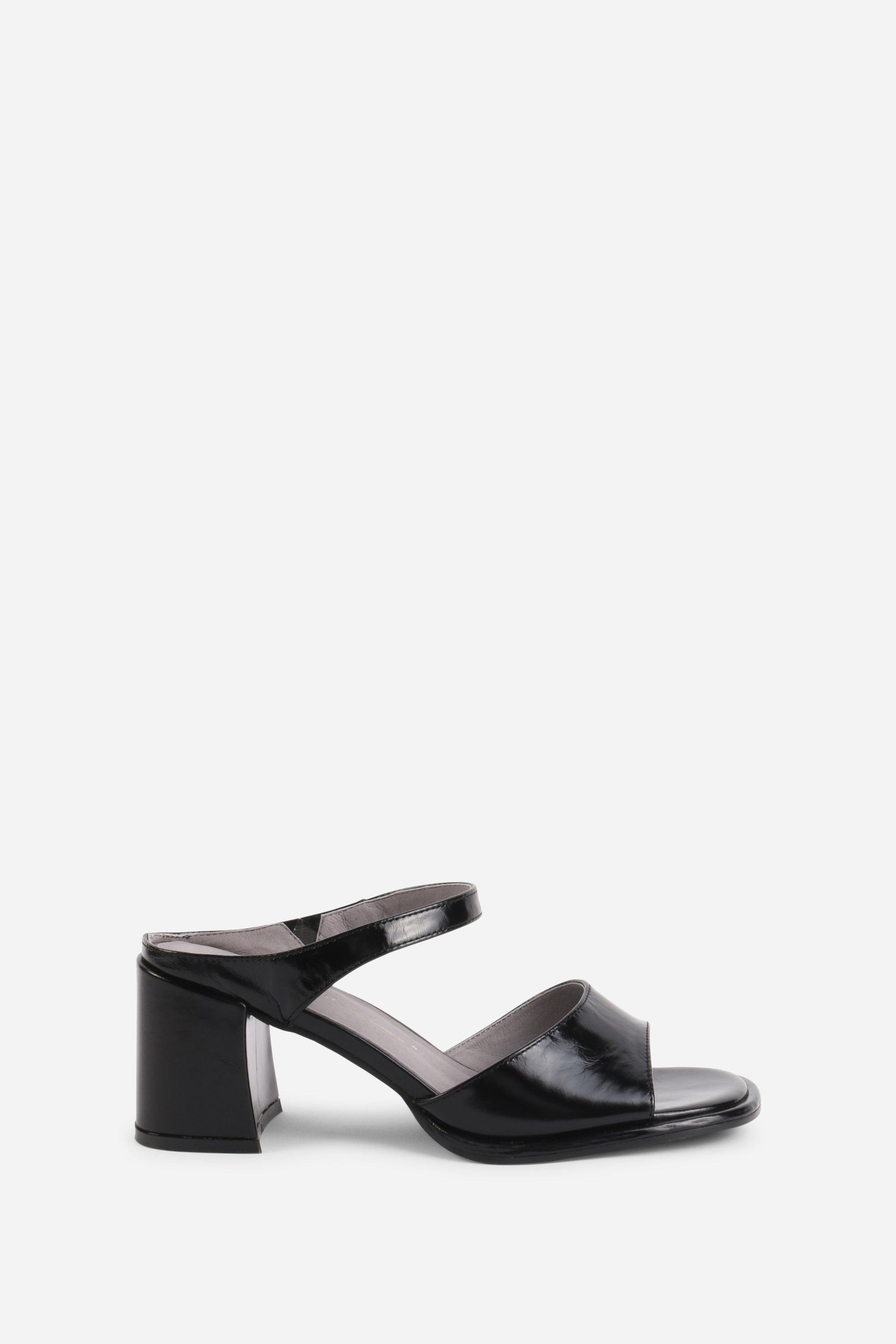 "INTENTIONALLY __________." Apex Block Heel Sandal