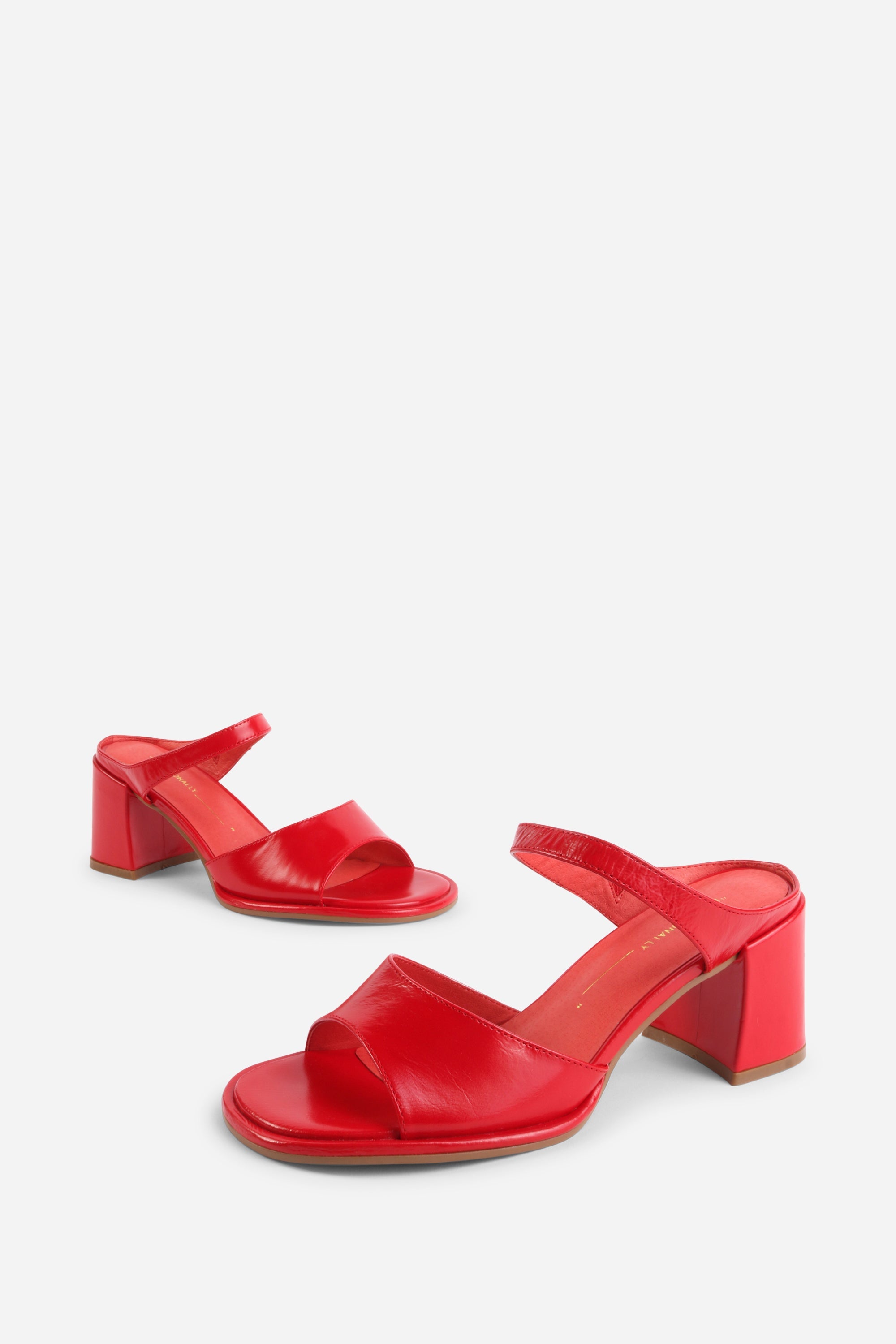 "INTENTIONALLY __________." Apex Block Heel Sandal