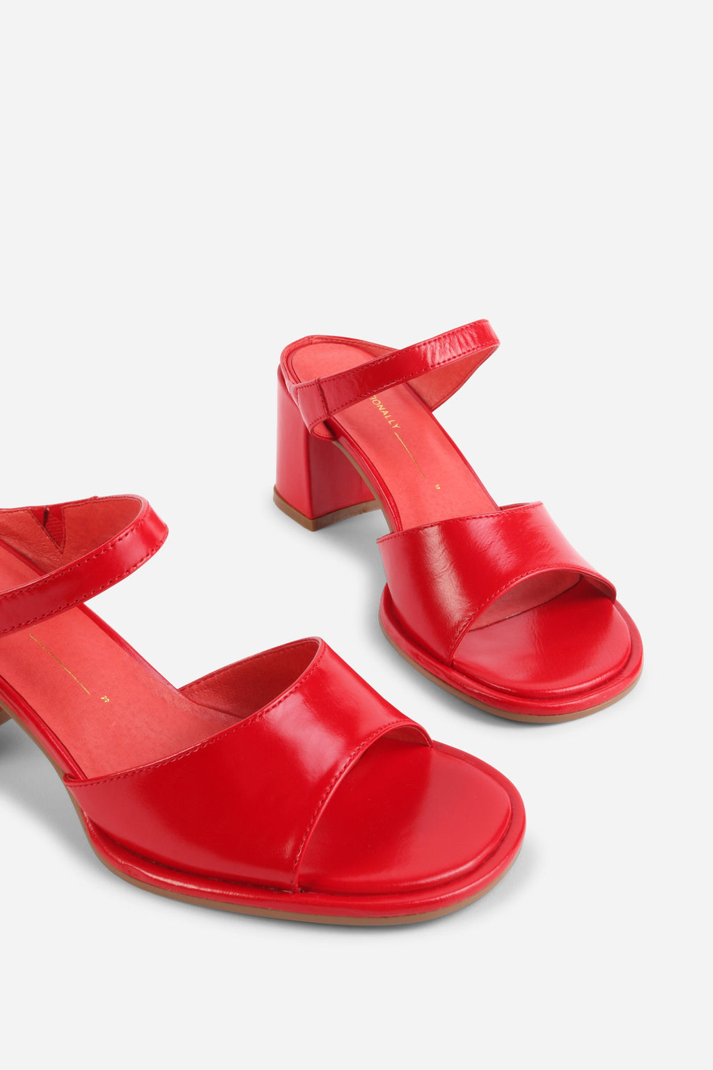 "INTENTIONALLY __________." Apex Block Heel Sandal