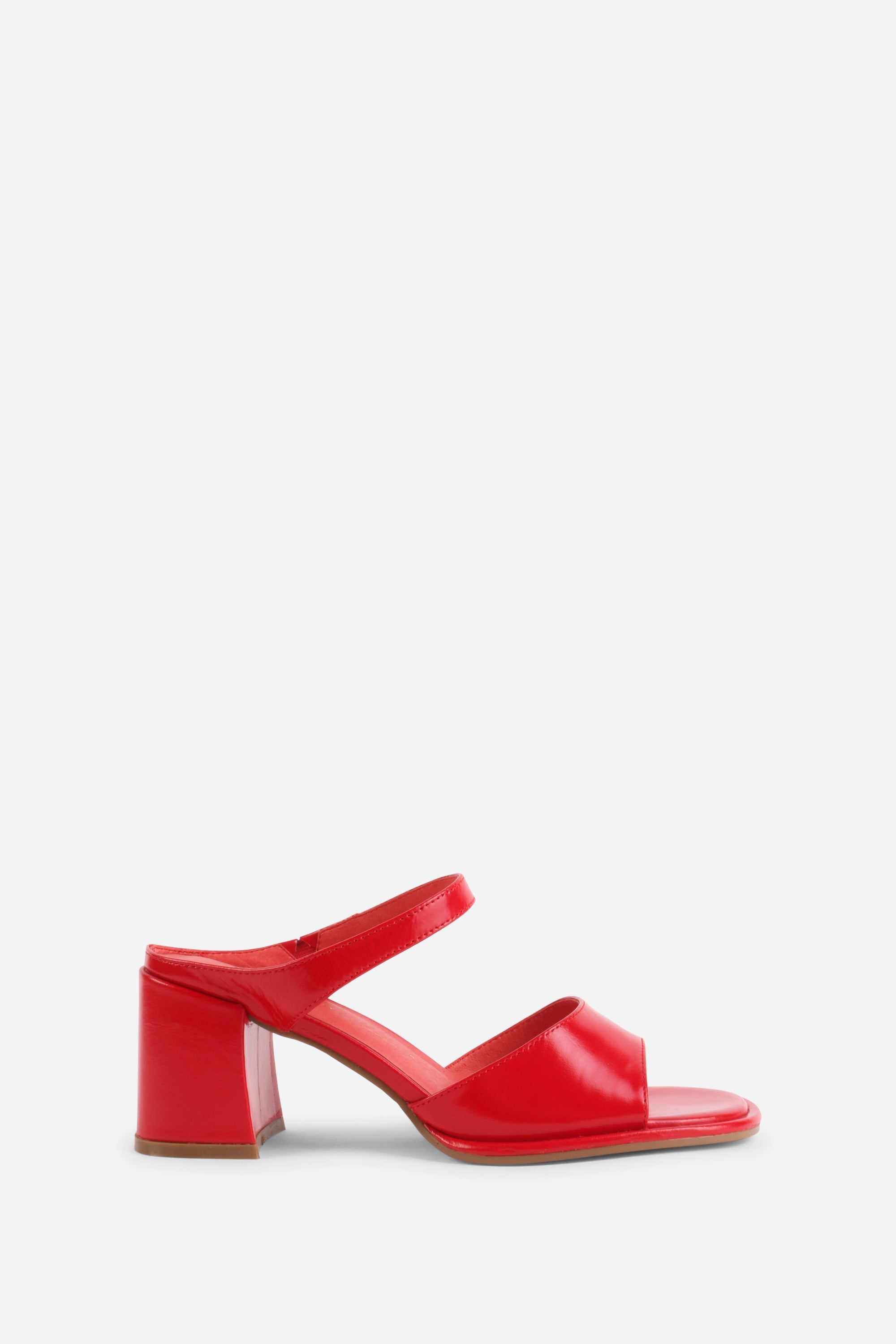 "INTENTIONALLY __________." Apex Block Heel Sandal