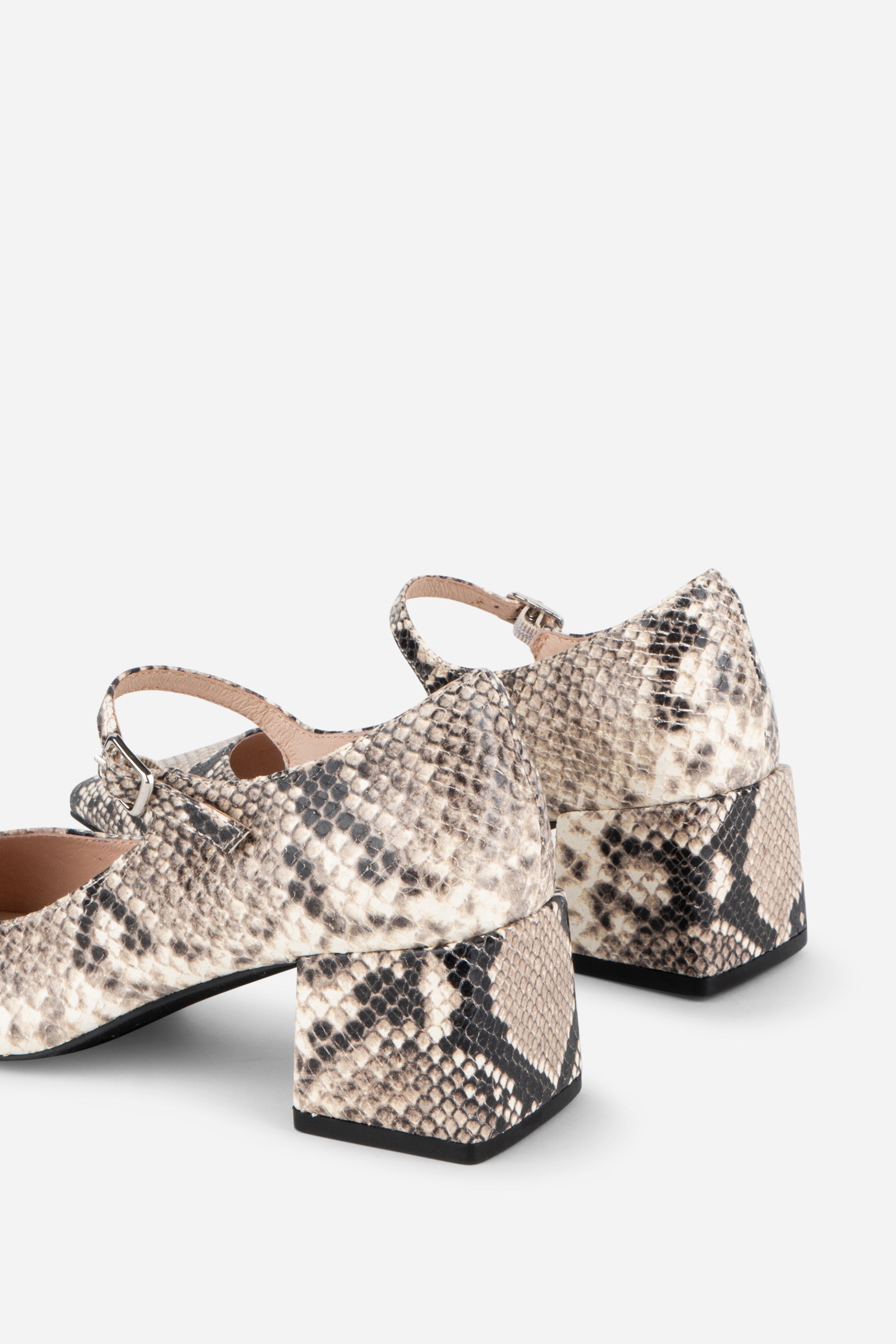 "INTENTIONALLY __________." Bond Snake Mary Jane Heel - Black White