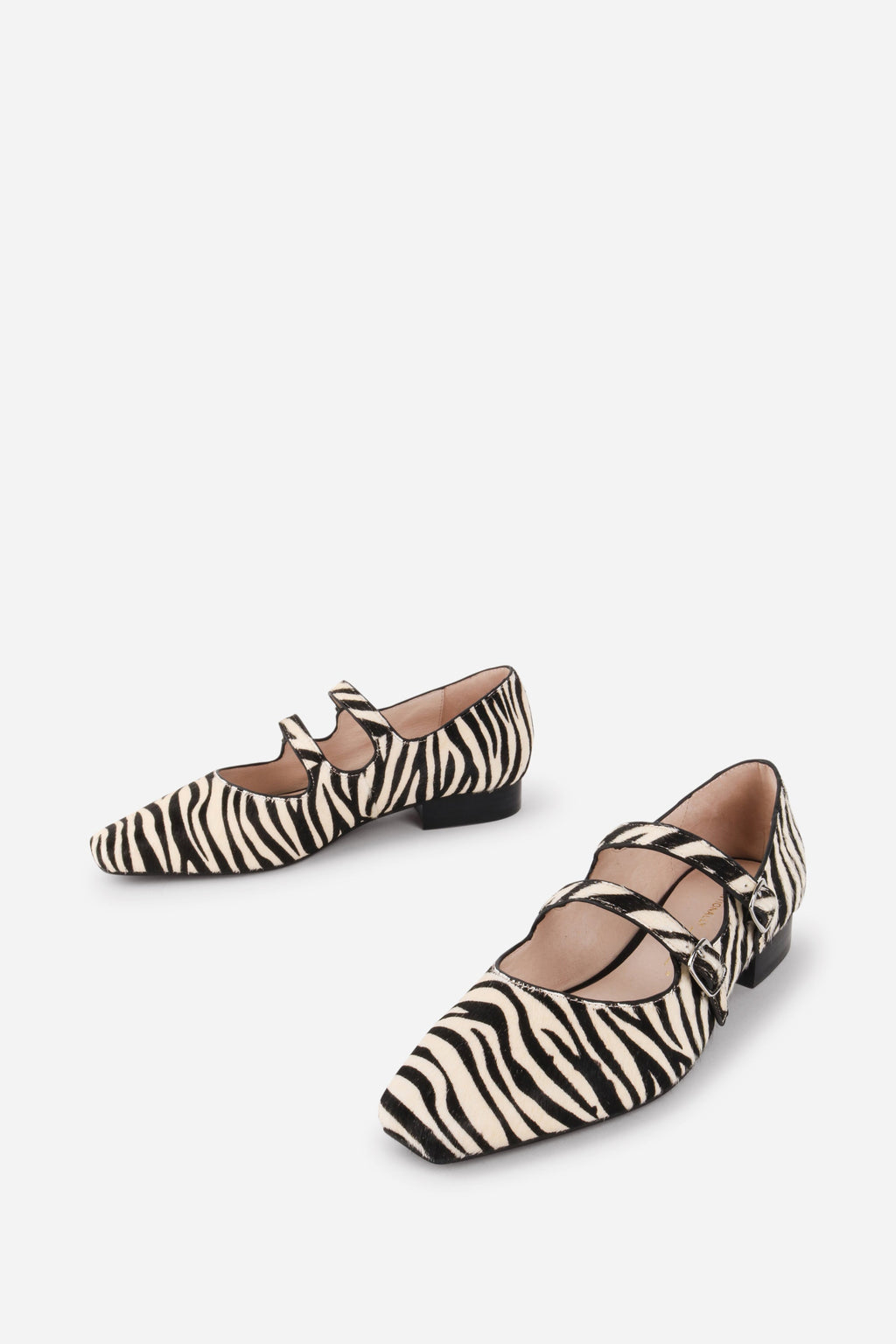 INTENTIONALLY __________. Calculated Calf Hair Mary Jane Flat - Zebra