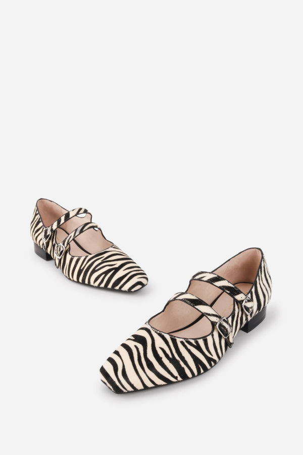 INTENTIONALLY __________. Calculated Calf Hair Mary Jane Flat - Zebra