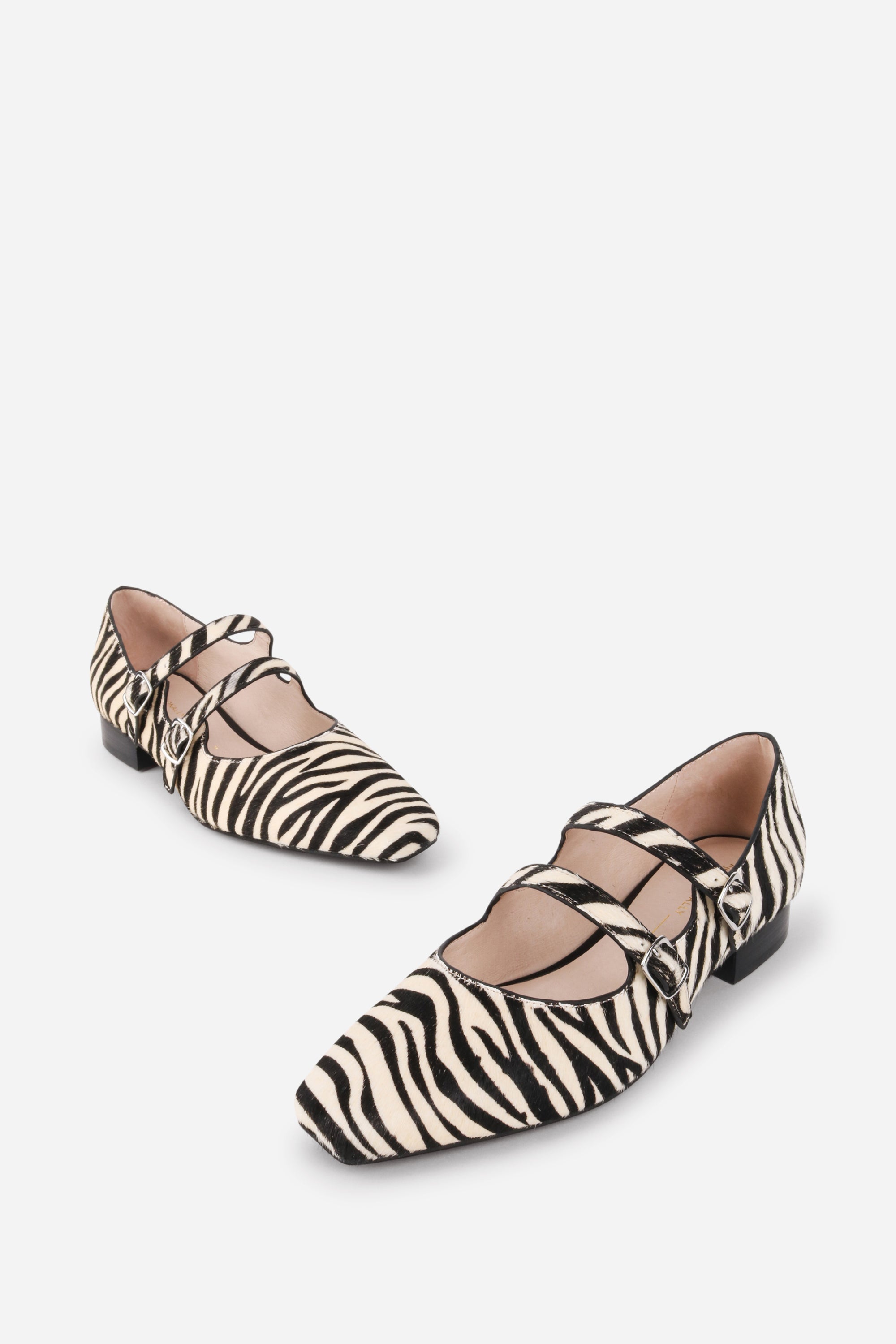 INTENTIONALLY __________. Calculated Calf Hair Mary Jane Flat - Zebra