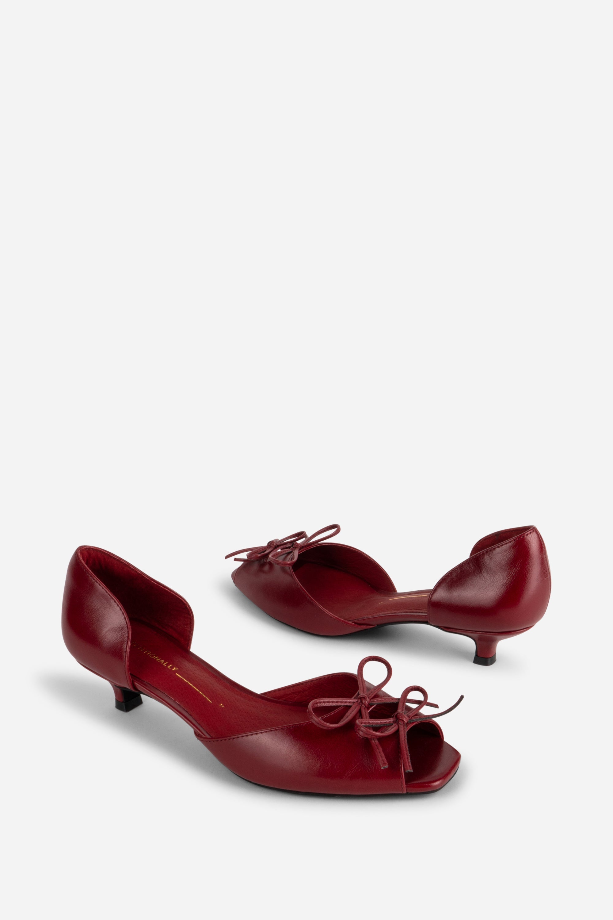 "INTENTIONALLY __________." Carol Peep Toe Kitten Heel