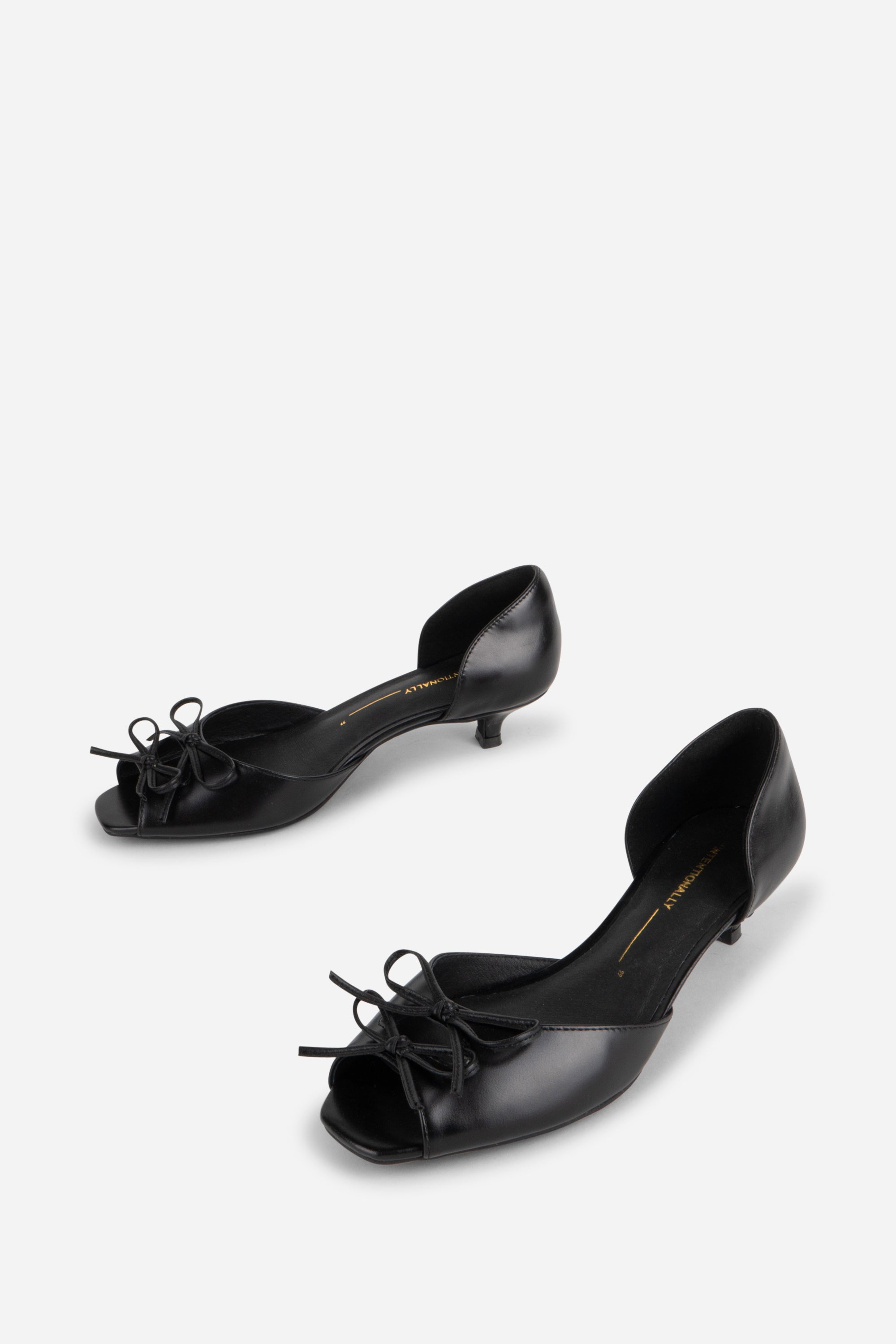 "INTENTIONALLY __________." Carol Peep Toe Kitten Heel