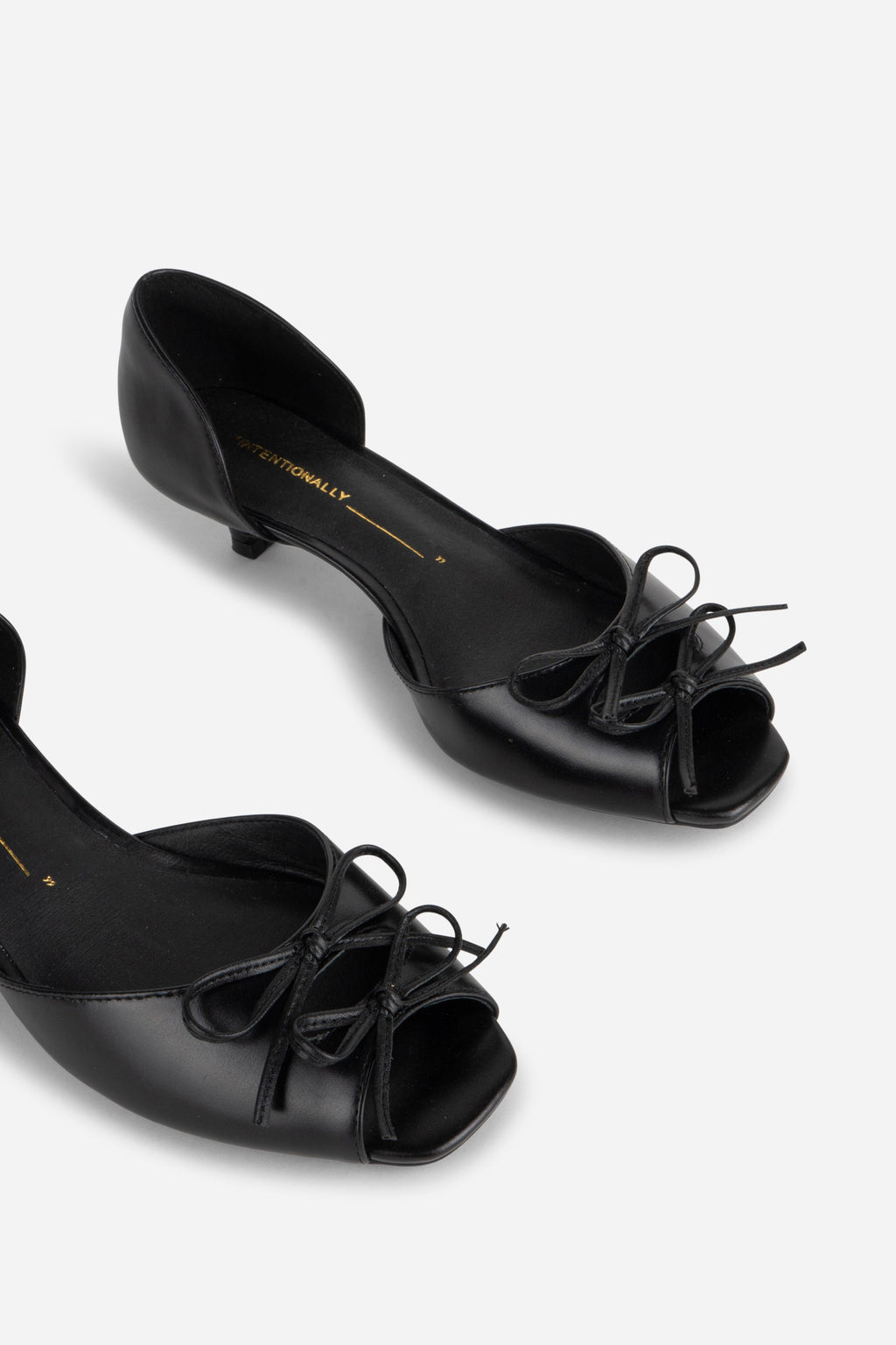 "INTENTIONALLY __________." Carol Peep Toe Kitten Heel