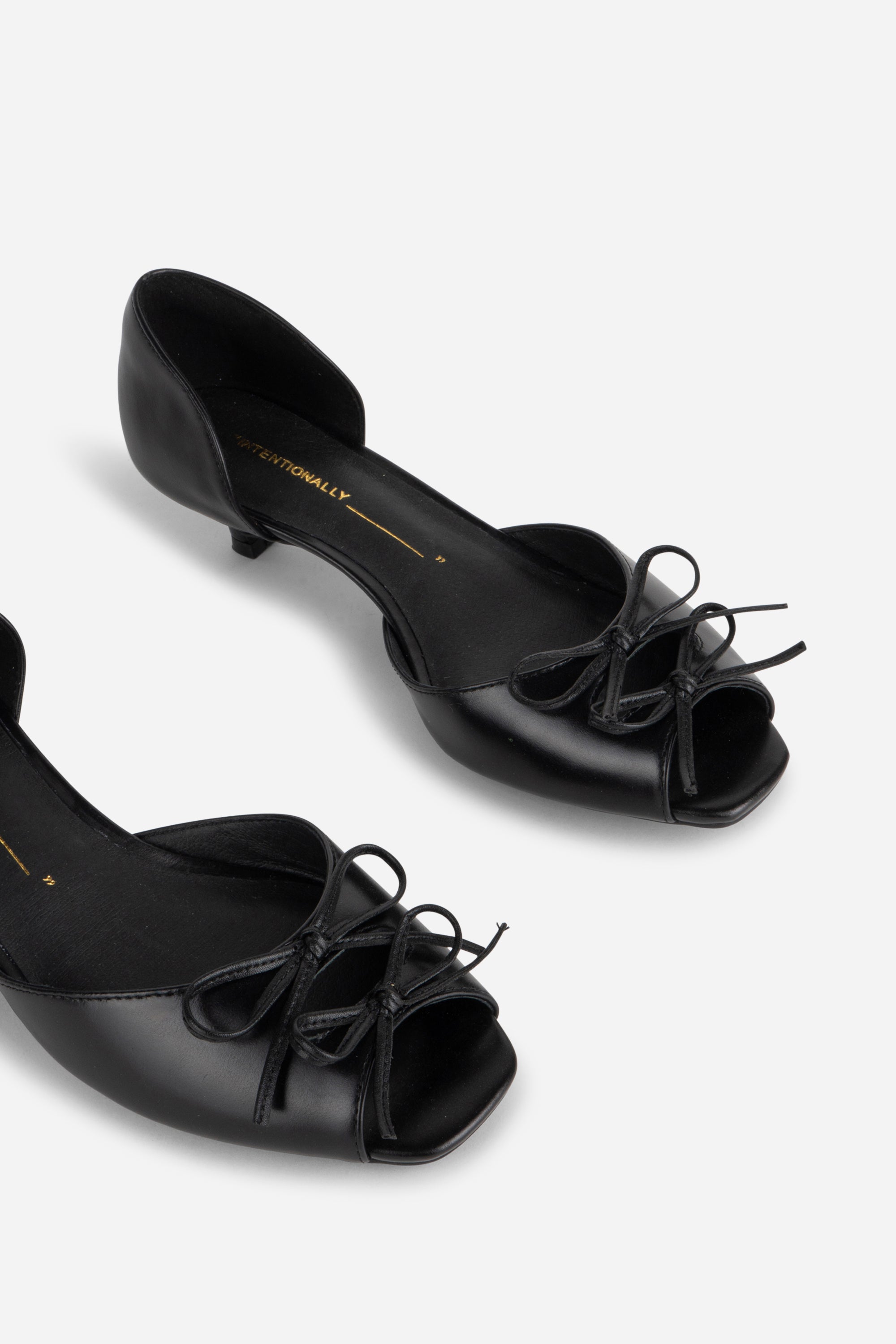 "INTENTIONALLY __________." Carol Peep Toe Kitten Heel