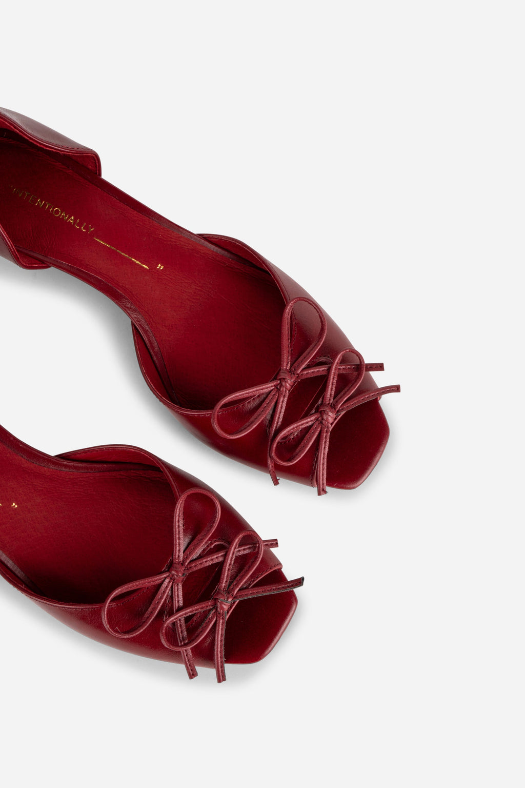 "INTENTIONALLY __________." Carol Peep Toe Kitten Heel