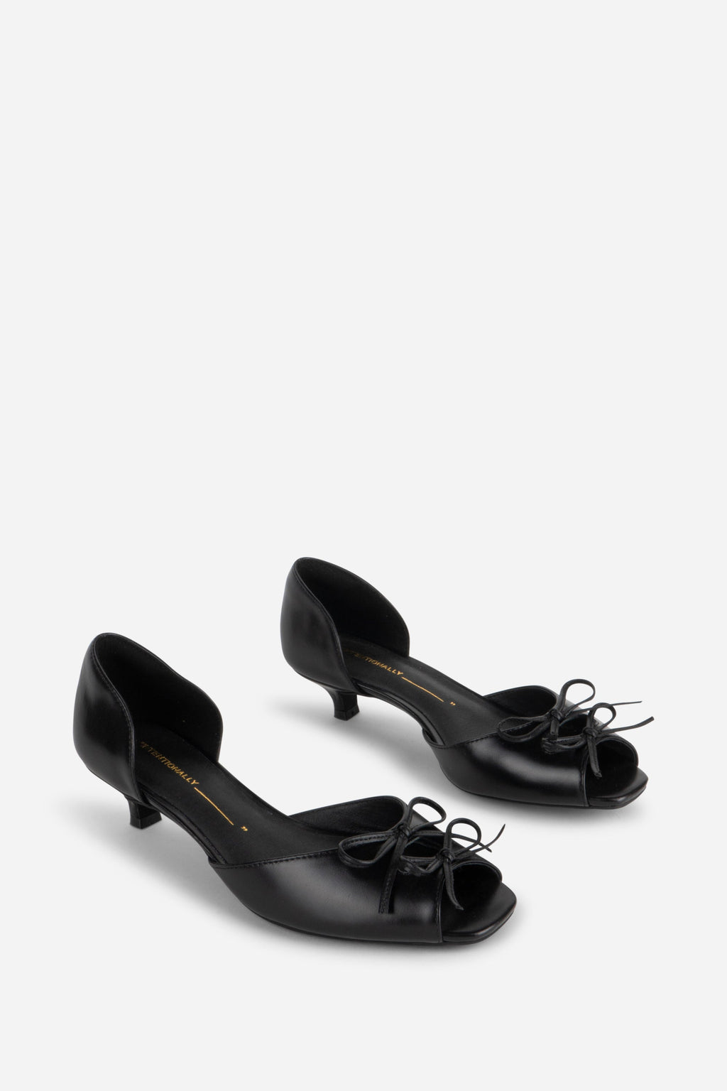 "INTENTIONALLY __________." Carol Peep Toe Kitten Heel