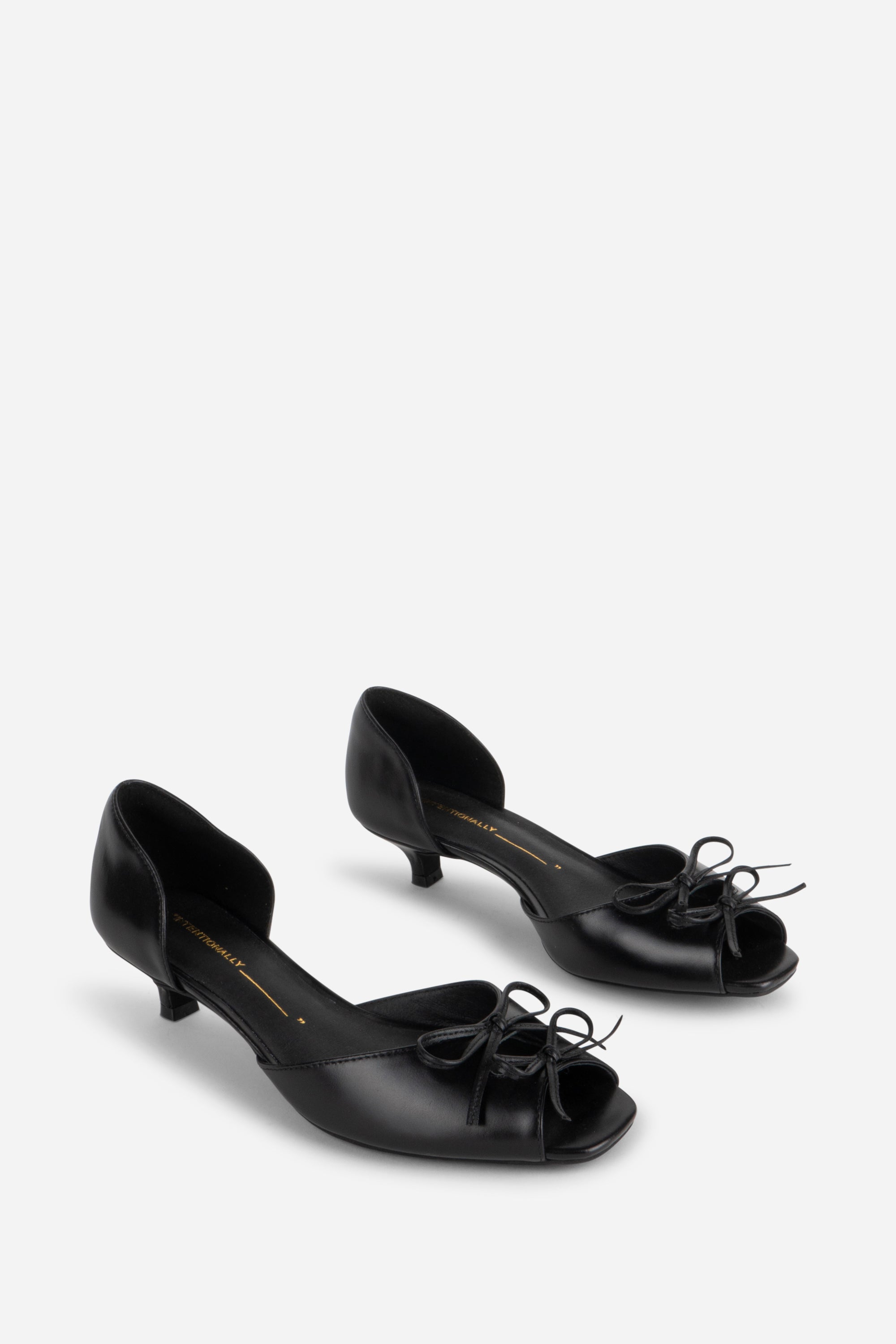 "INTENTIONALLY __________." Carol Peep Toe Kitten Heel