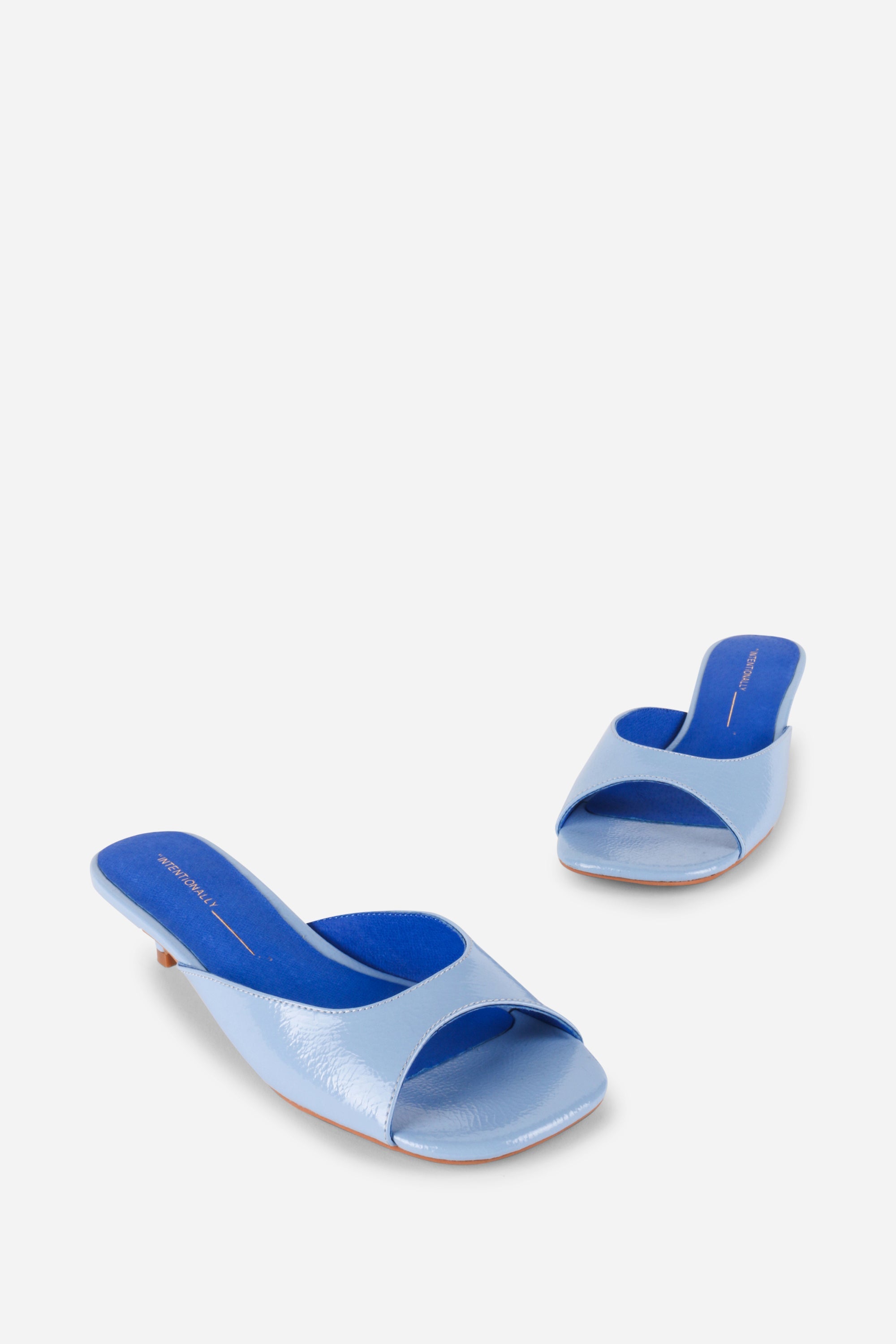 "INTENTIONALLY __________." Cee Kitten Heel Mule Shoes