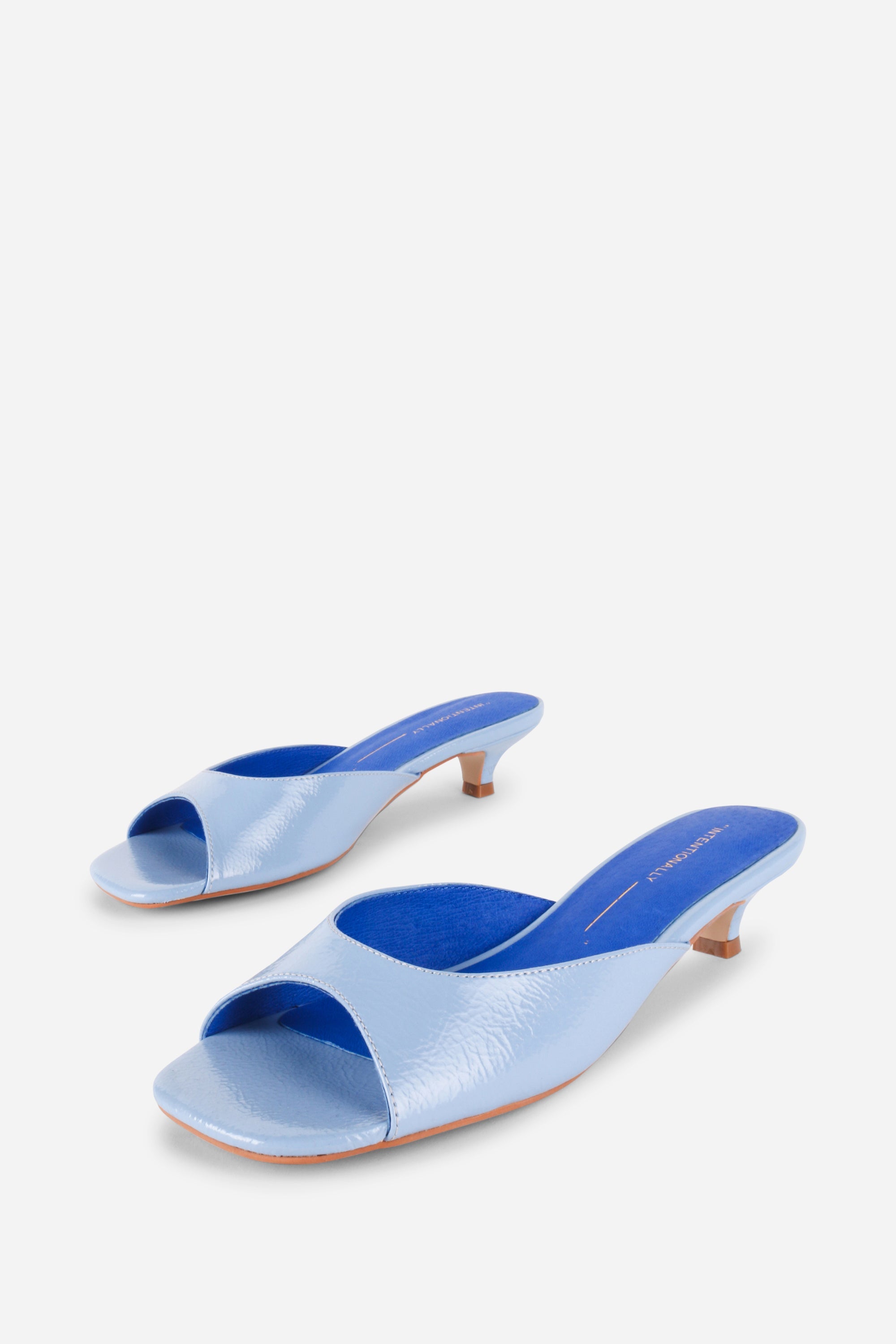 "INTENTIONALLY __________." Cee Kitten Heel Mule Shoes