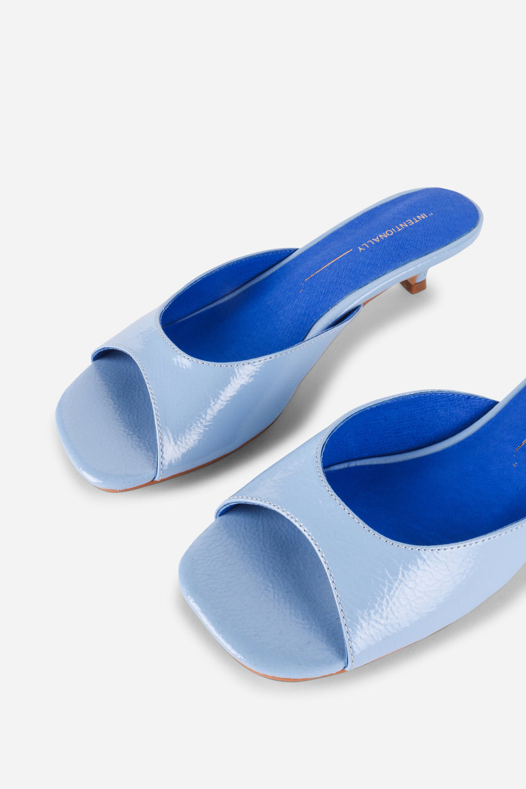 "INTENTIONALLY __________." Cee Kitten Heel Mule Shoes