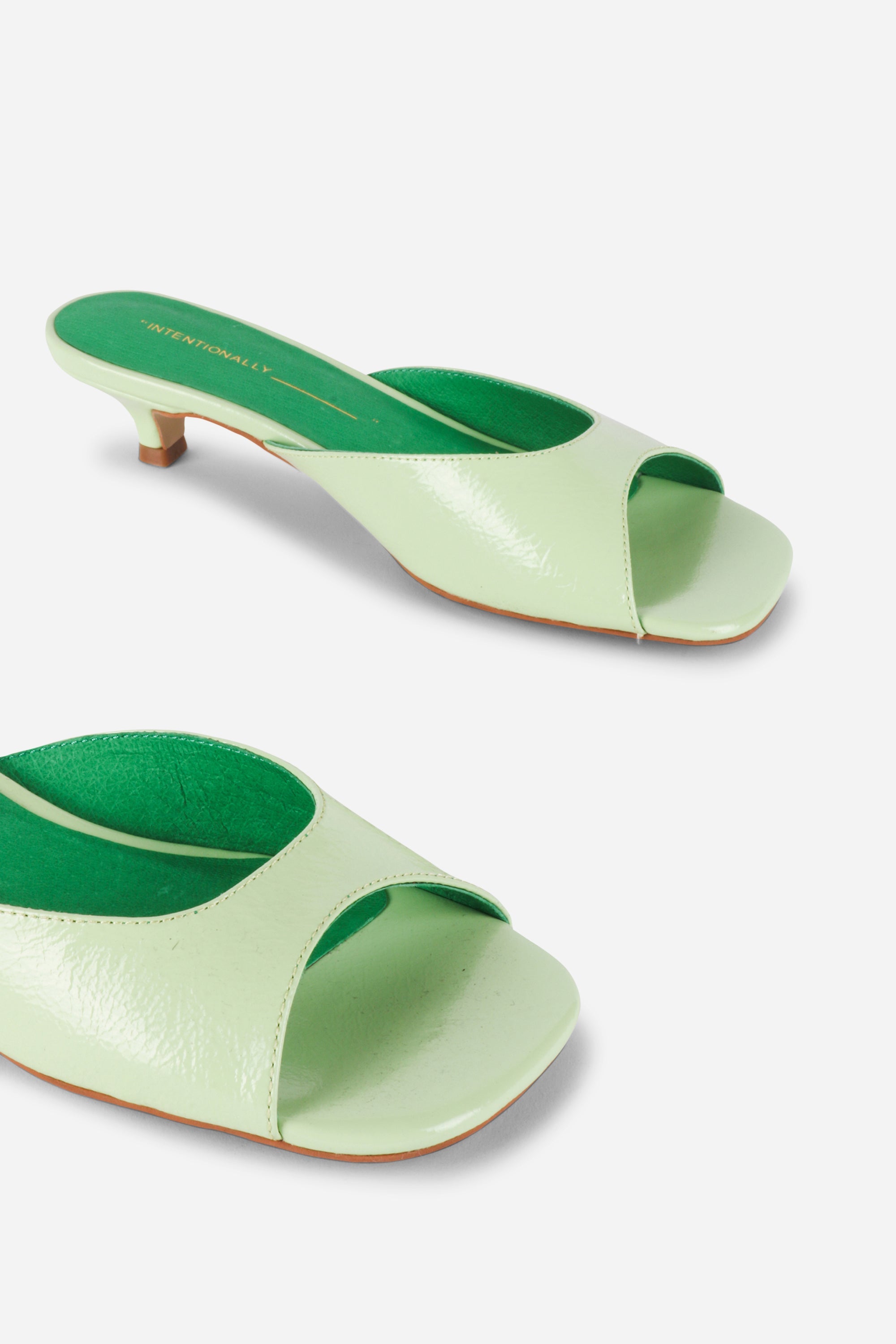 "INTENTIONALLY __________." Cee Kitten Heel Mule Shoes