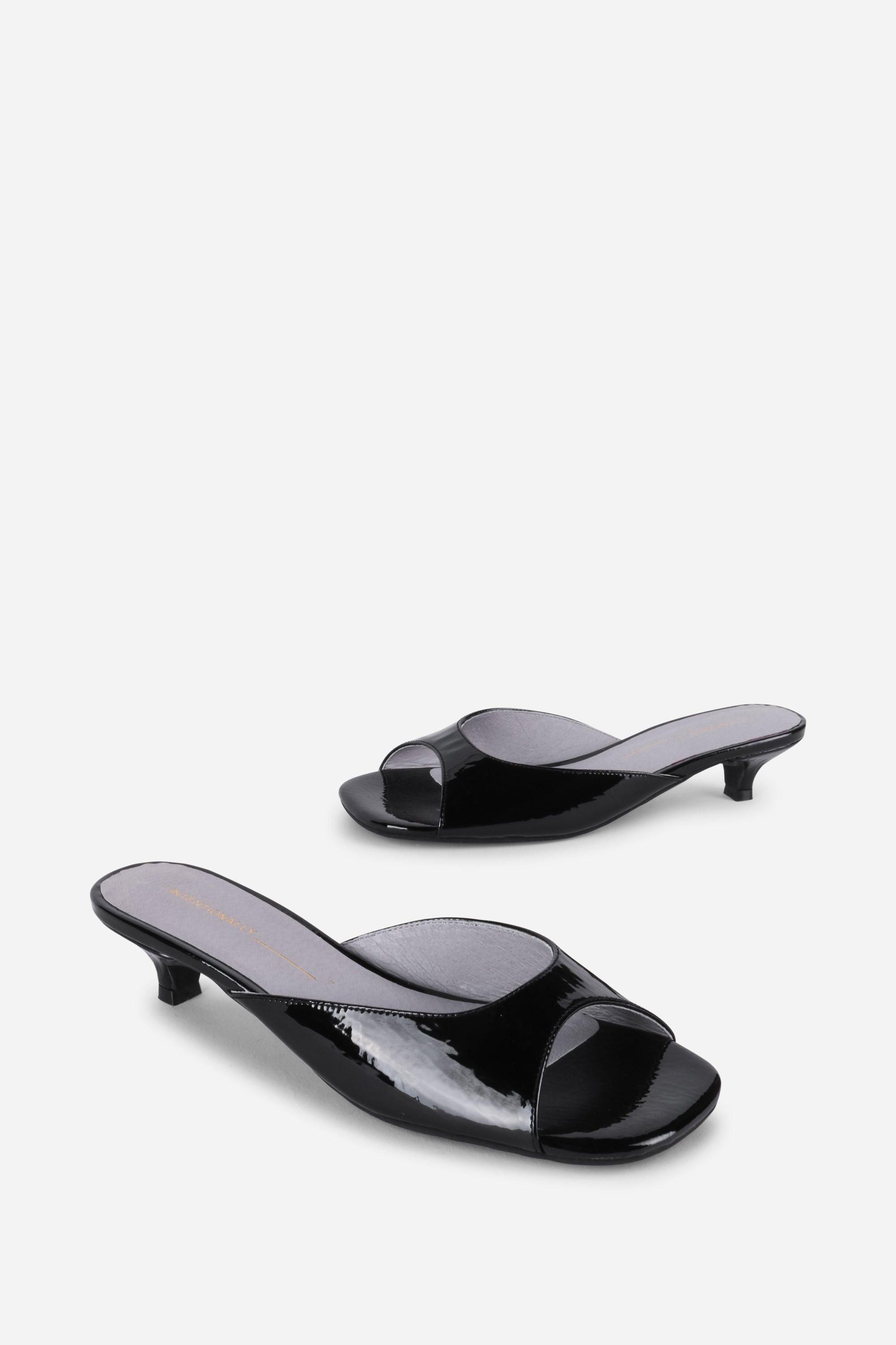 "INTENTIONALLY __________." Cee Kitten Heel Mule Shoes