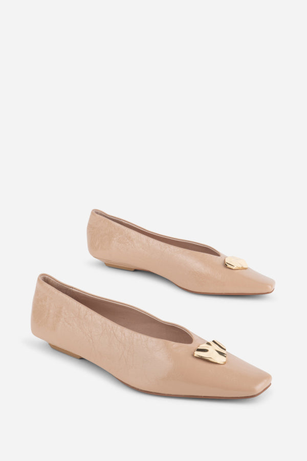"INTENTIONALLY __________." Celda Crinkle Patent Flat