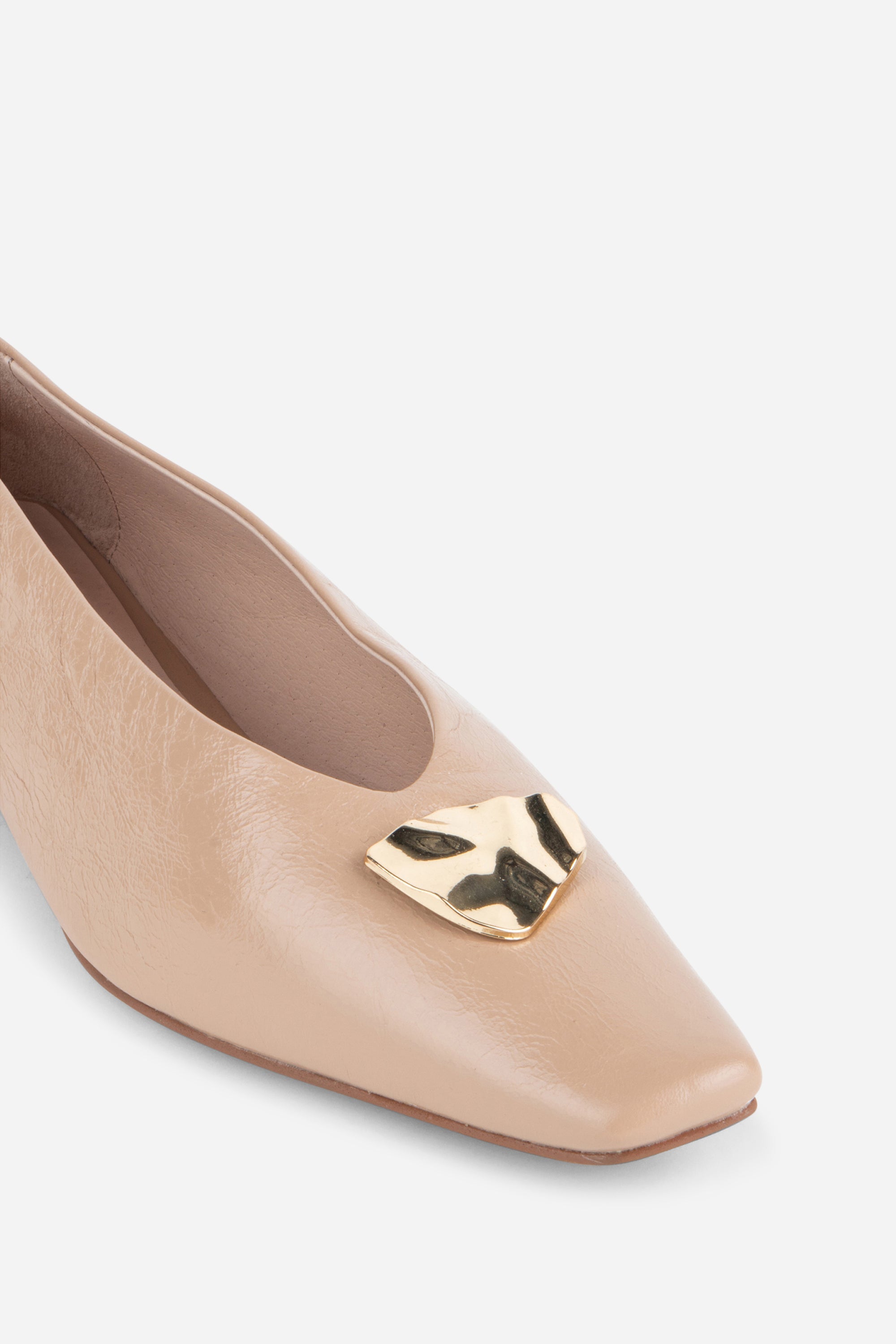"INTENTIONALLY __________." Celda Crinkle Patent Flat