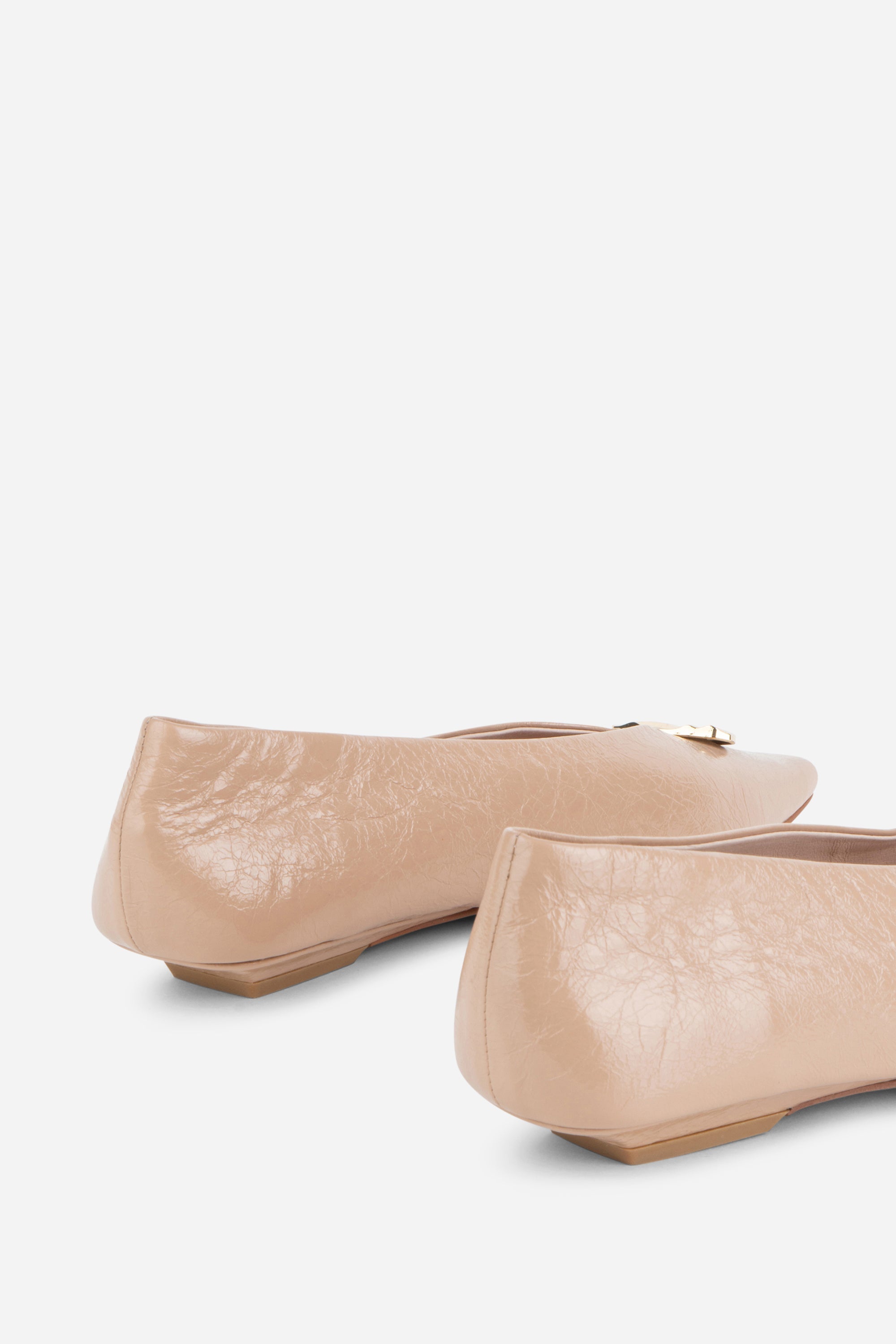 "INTENTIONALLY __________." Celda Crinkle Patent Flat