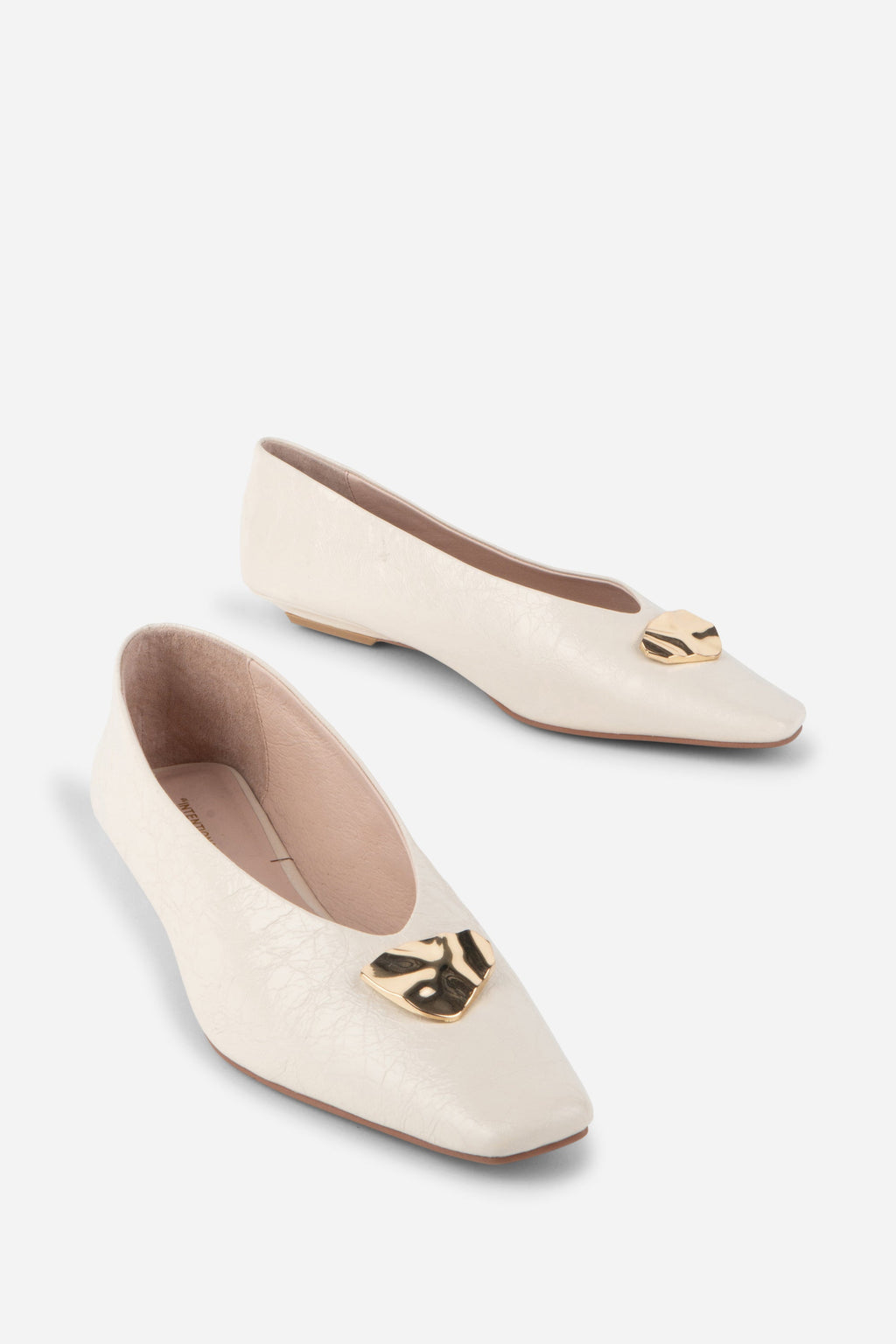 "INTENTIONALLY __________." Celda Crinkle Patent Flat