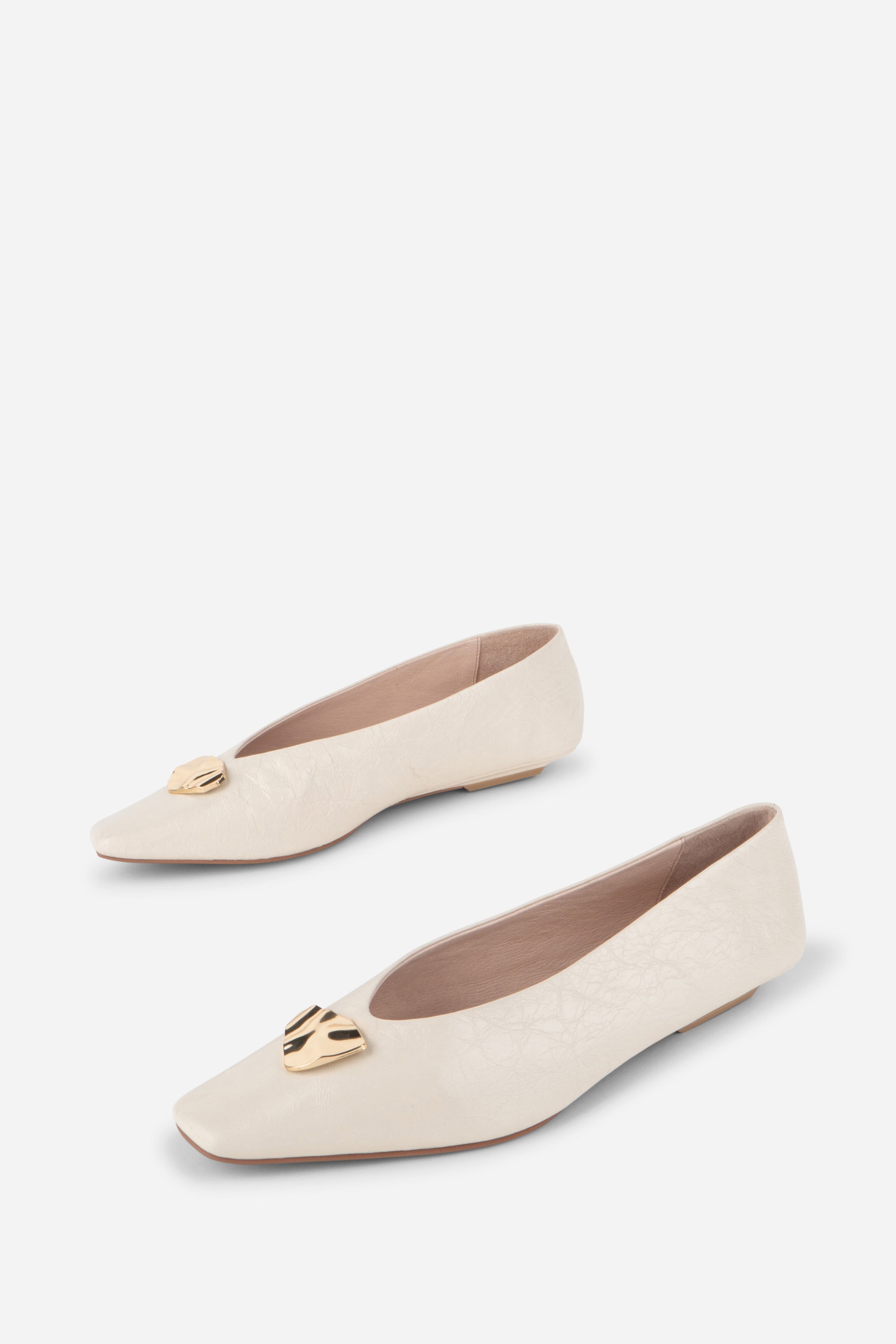 "INTENTIONALLY __________." Celda Crinkle Patent Flat