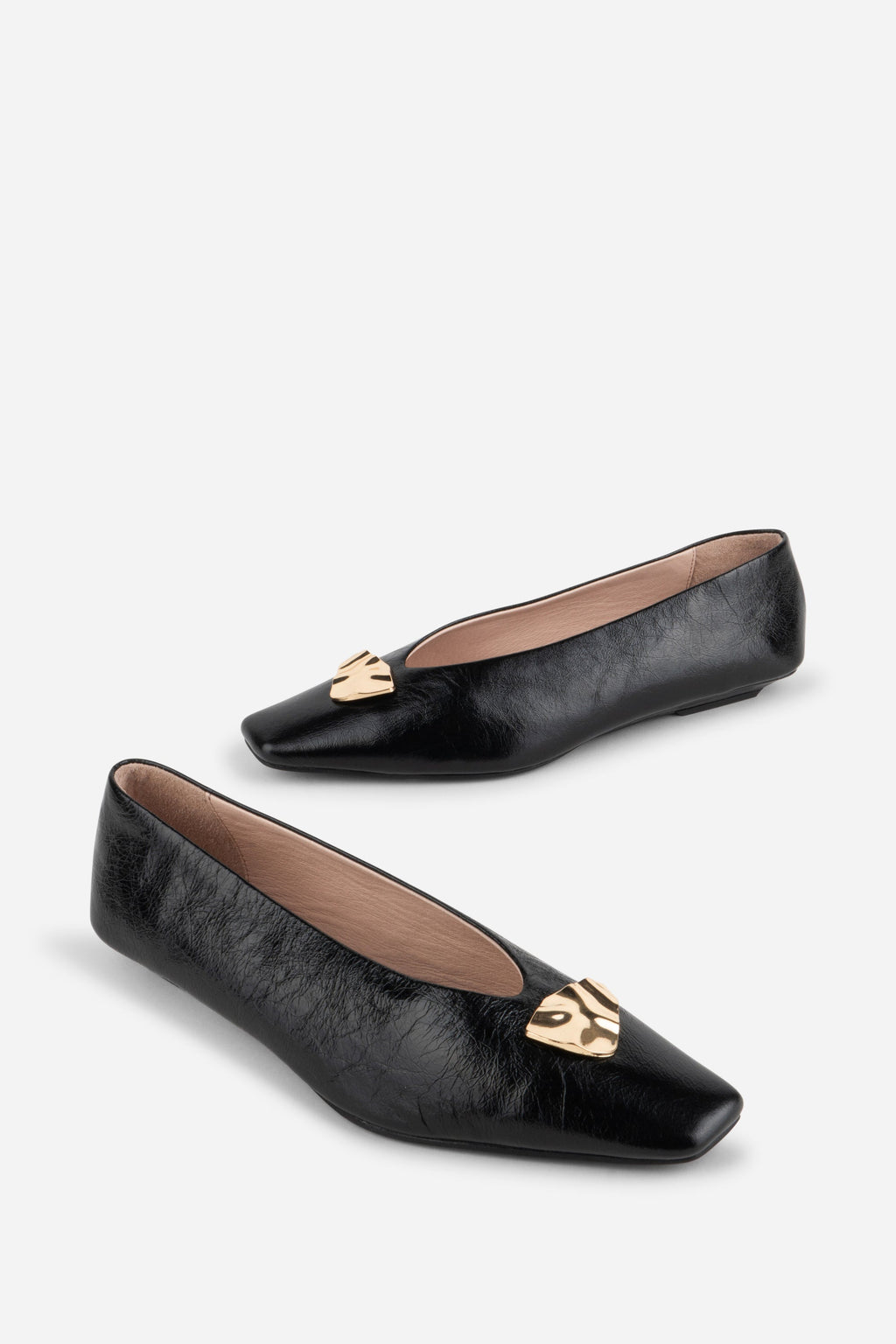 "INTENTIONALLY __________." Celda Crinkle Patent Flat