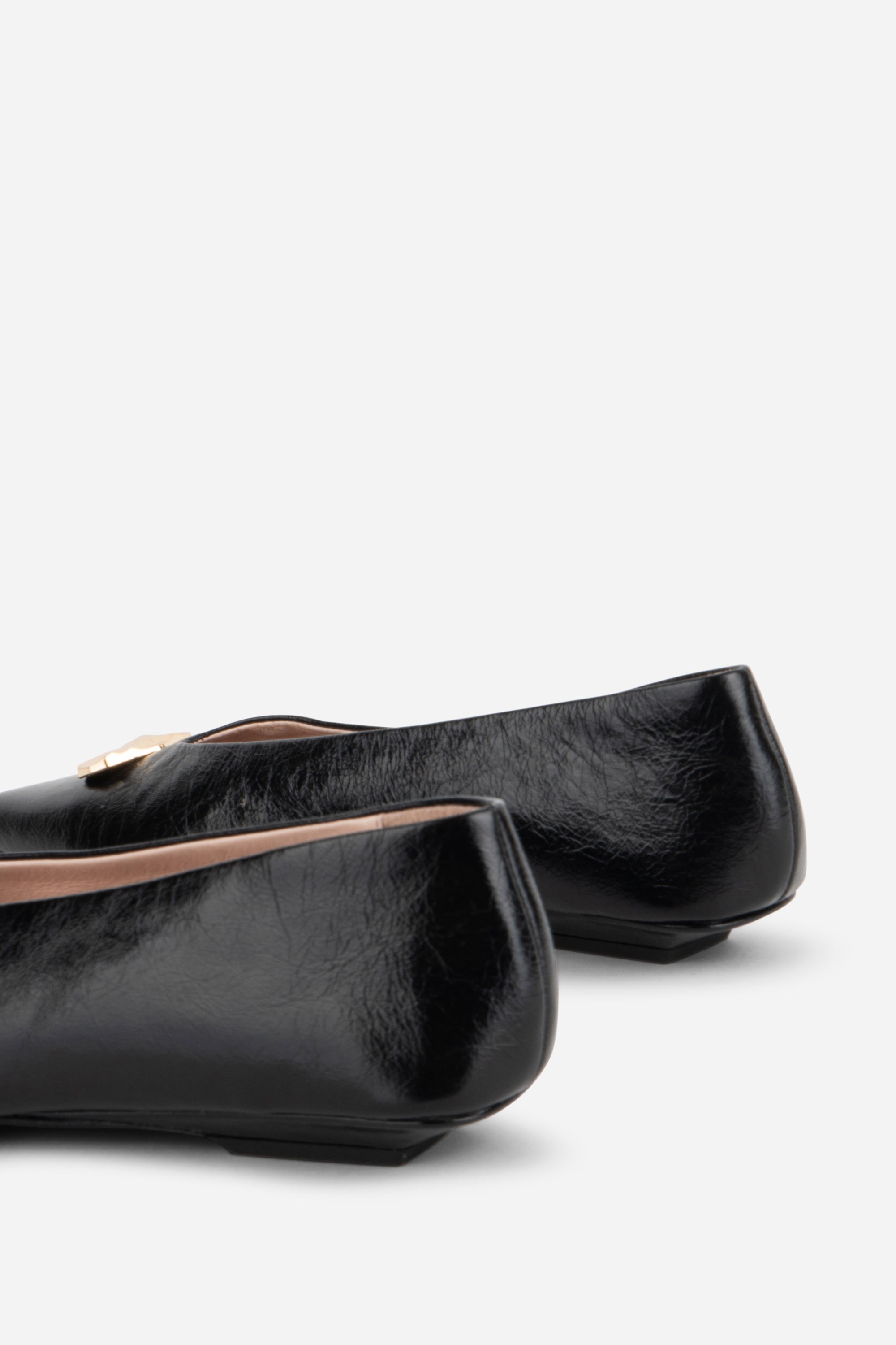 "INTENTIONALLY __________." Celda Crinkle Patent Flat