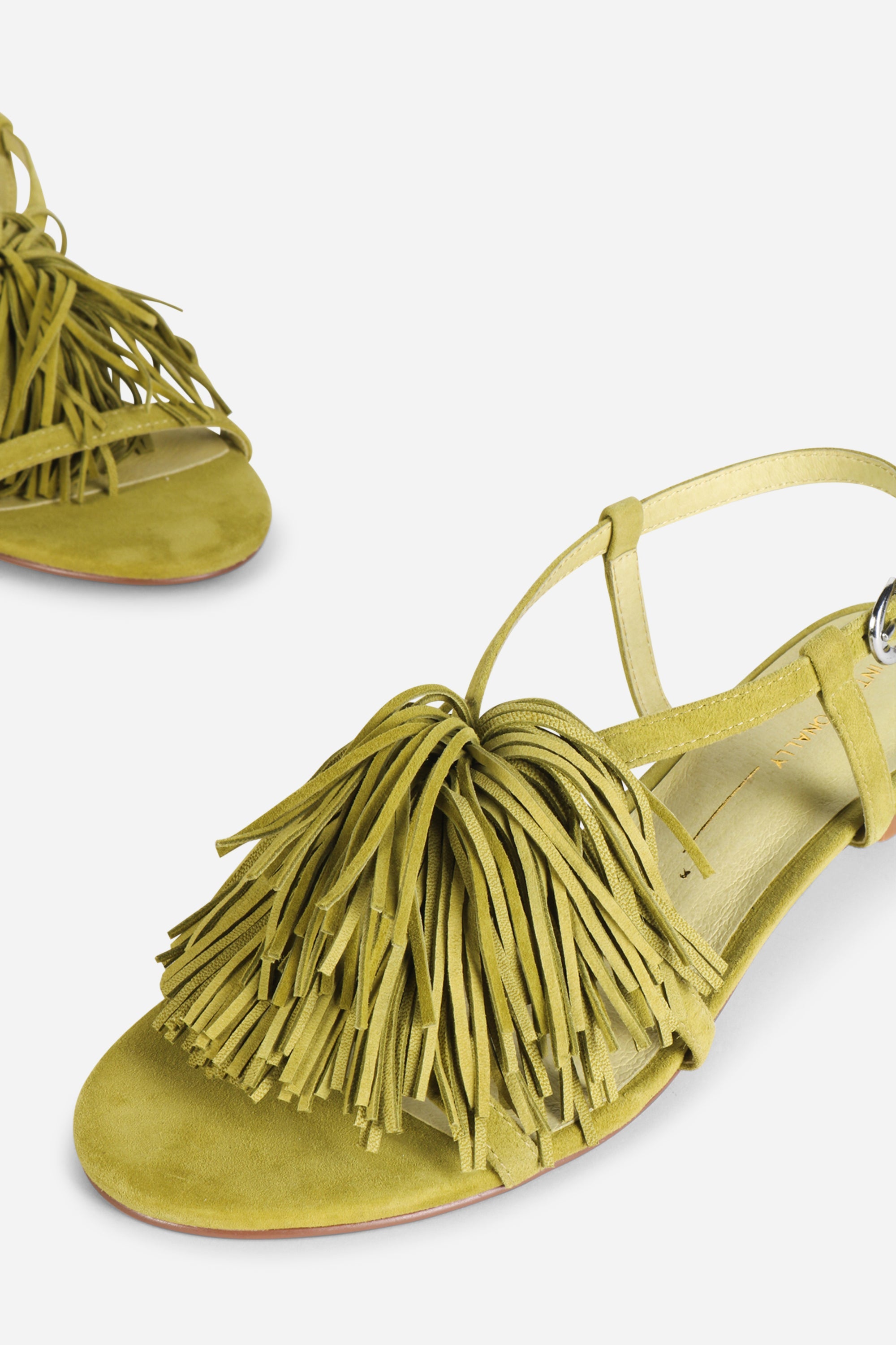 INTENTIONALLY __________. Chaperone Fringe Kitten Heel Sandals