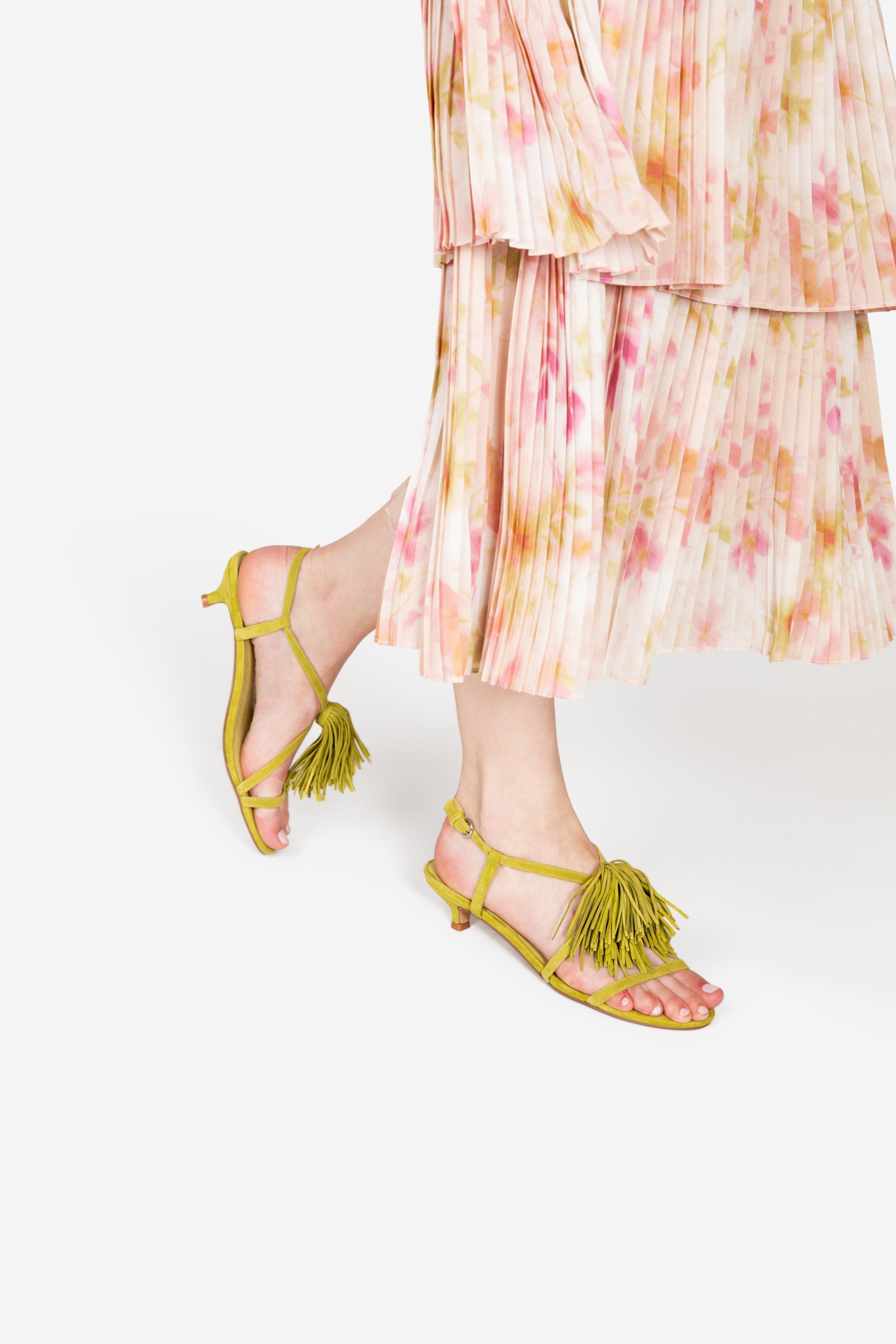 INTENTIONALLY __________. Chaperone Fringe Kitten Heel Sandals