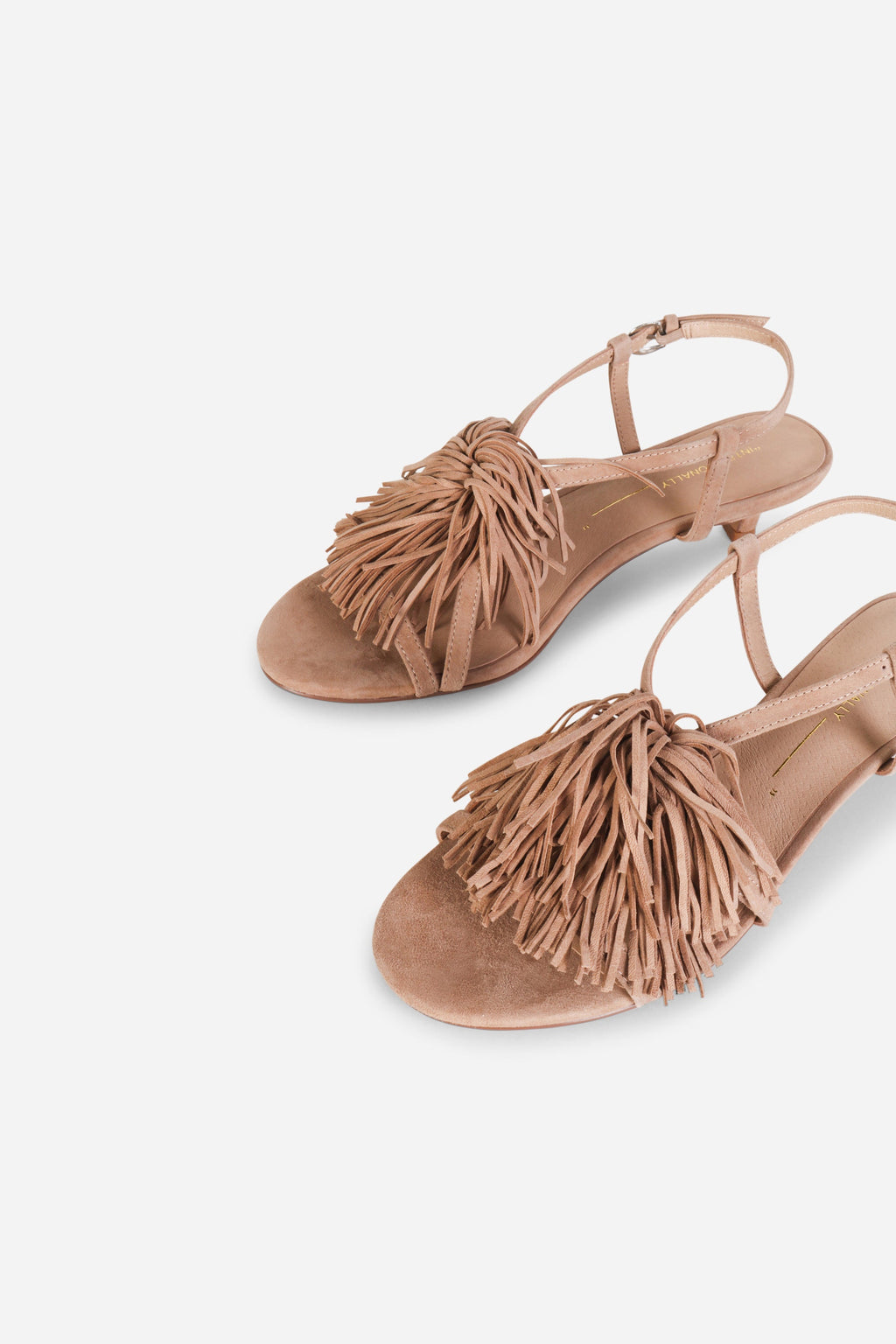 INTENTIONALLY __________. Chaperone Fringe Kitten Heel Sandals