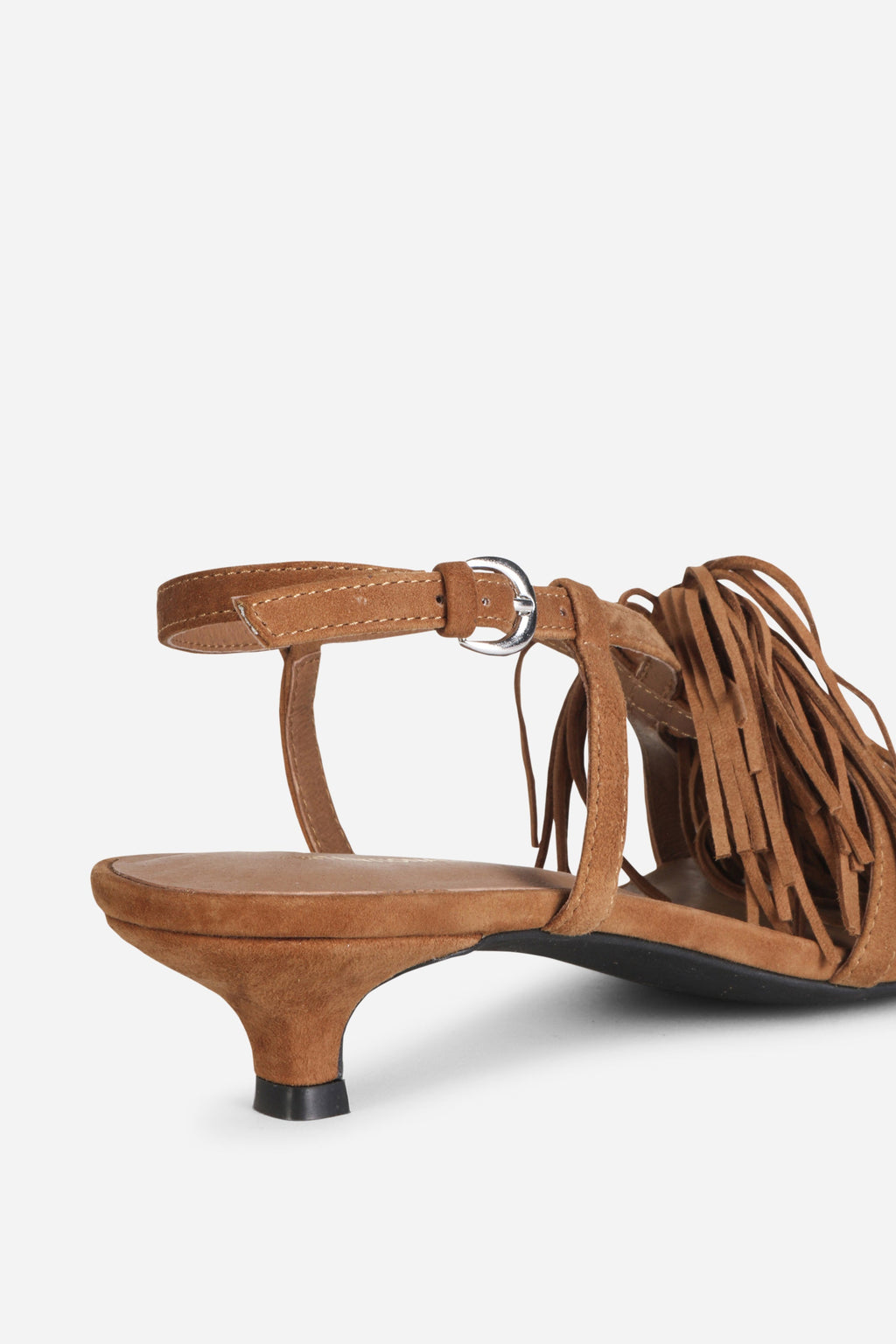 INTENTIONALLY __________. Chaperone Fringe Kitten Heel Sandals