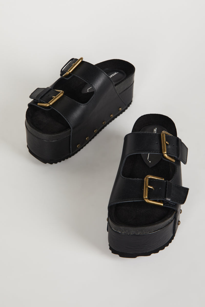 "INTENTIONALLY __________." Cooper-2 Platform Sandal
