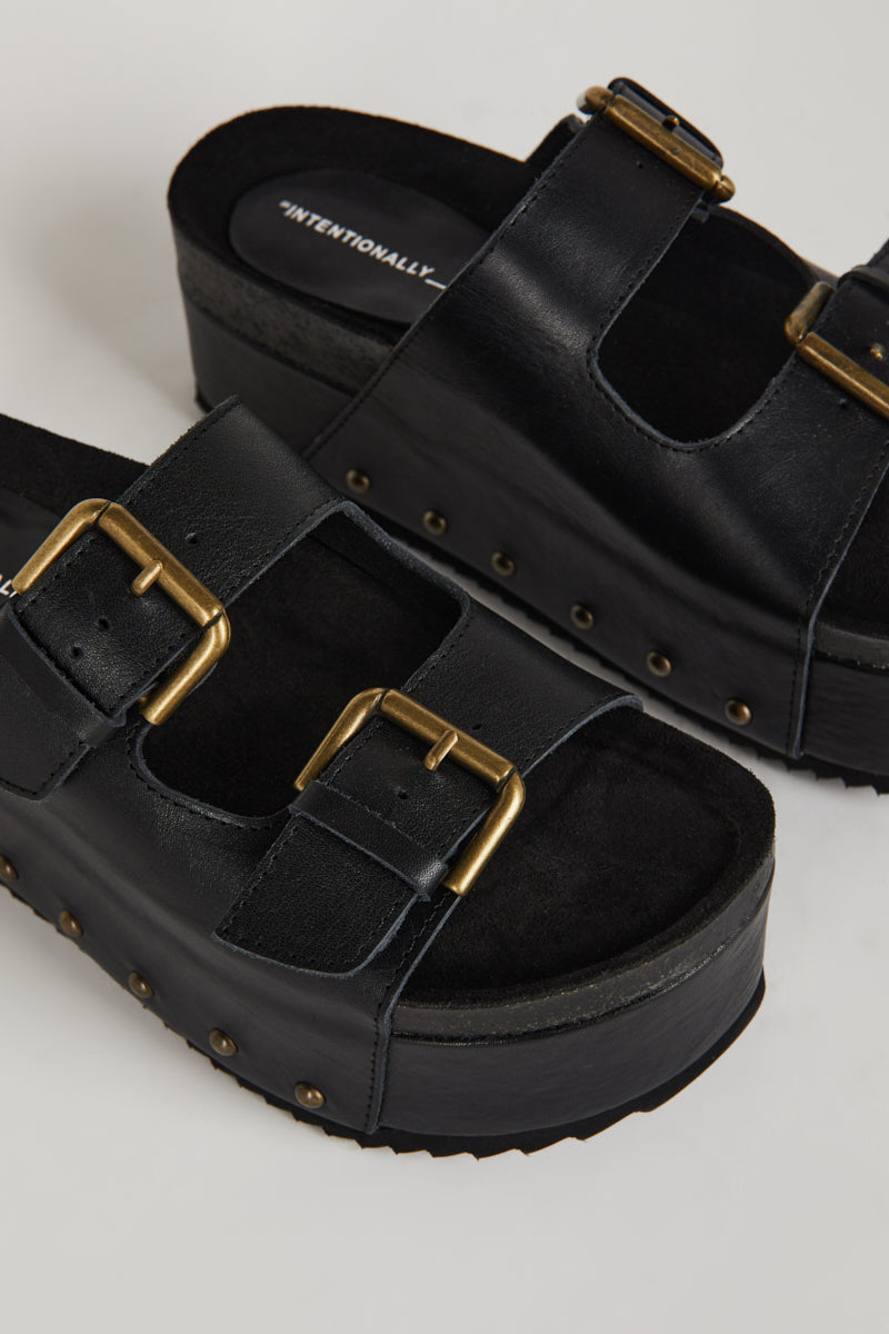 "INTENTIONALLY __________." Cooper-2 Platform Sandal