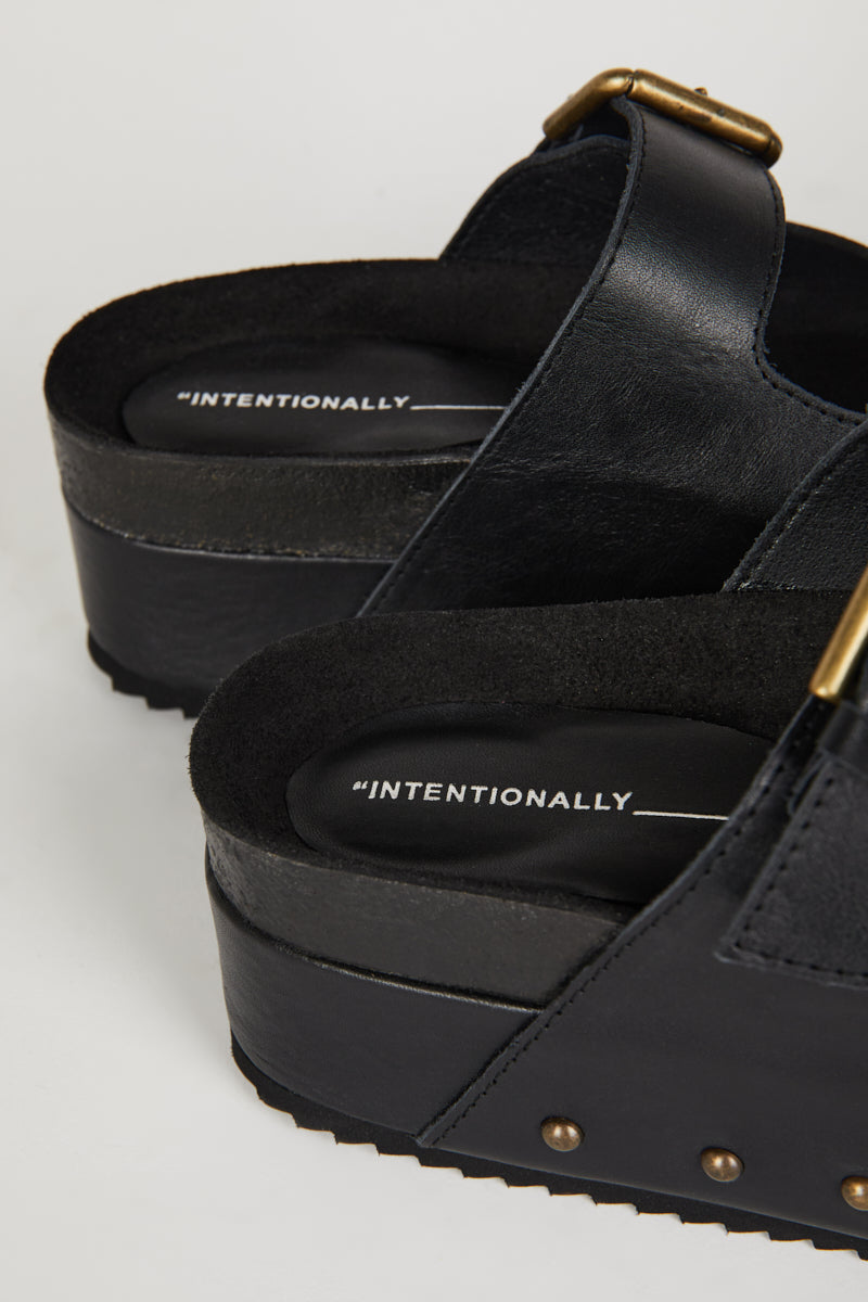 "INTENTIONALLY __________." Cooper-2 Platform Sandal