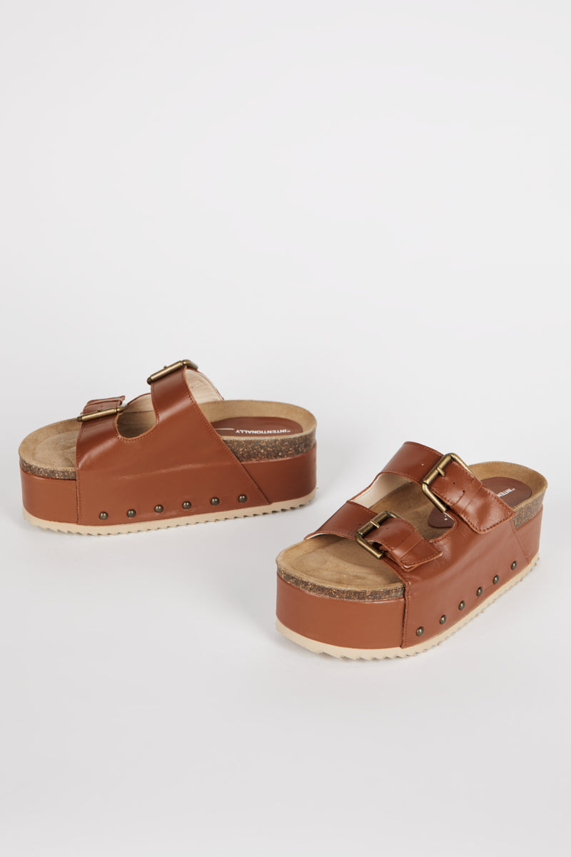 "INTENTIONALLY __________." Cooper-2 Platform Sandal