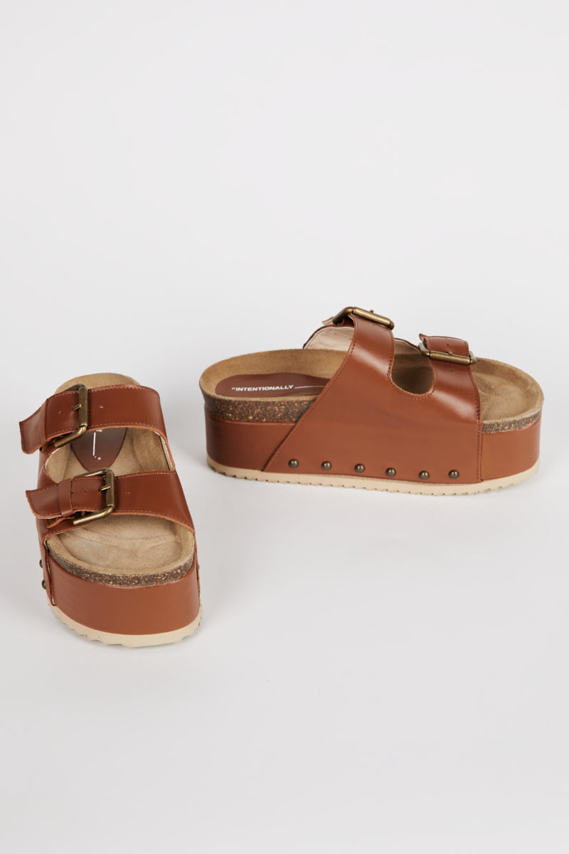 "INTENTIONALLY __________." Cooper-2 Platform Sandal