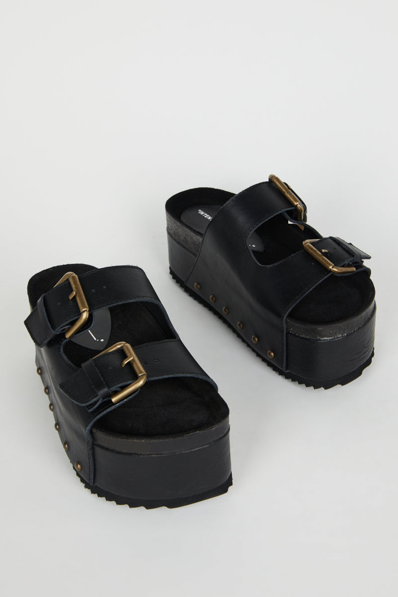 "INTENTIONALLY __________." Cooper-2 Platform Sandal