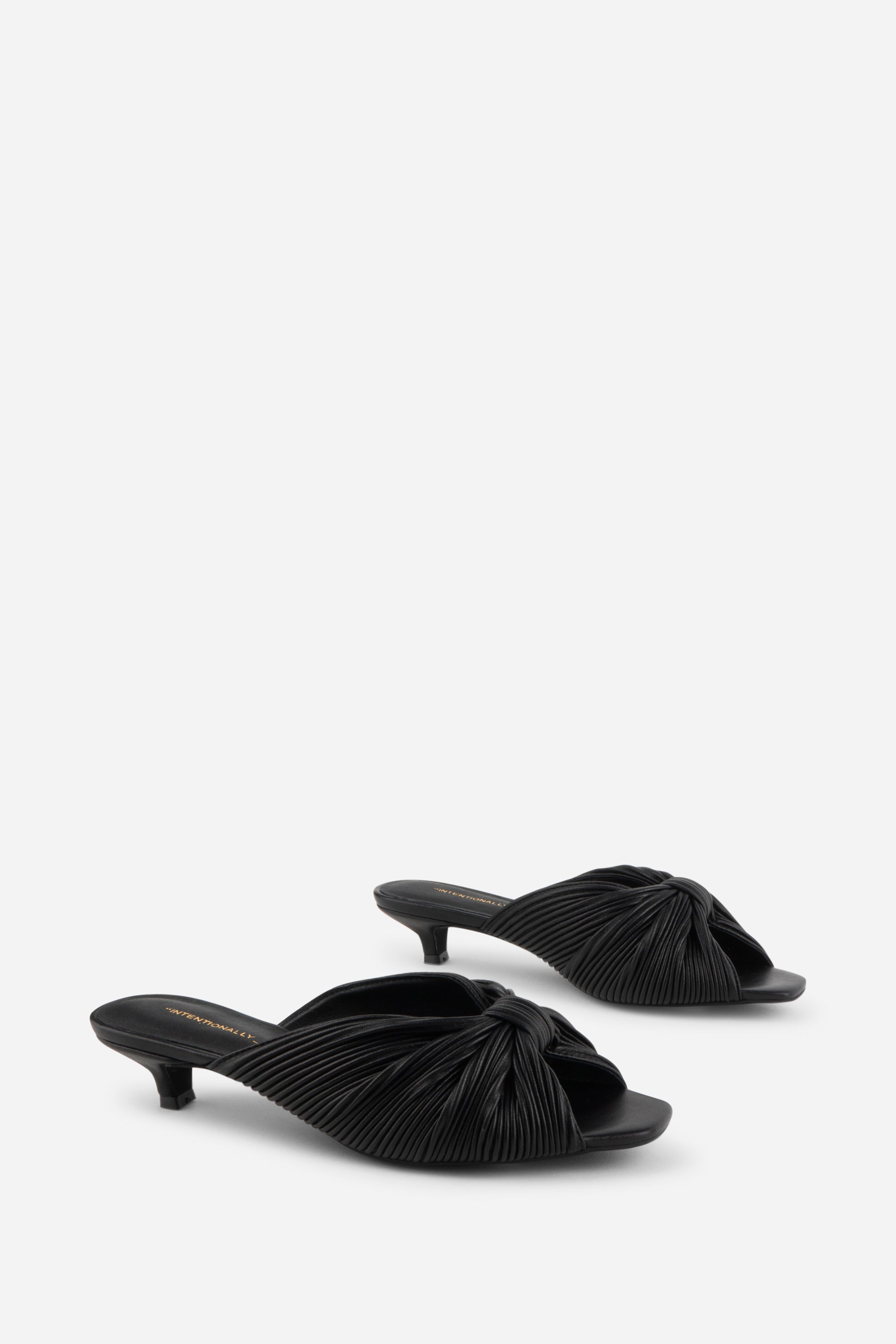 "INTENTIONALLY __________." Curfew Leather Kitten Heel - Cream/Black/Clay