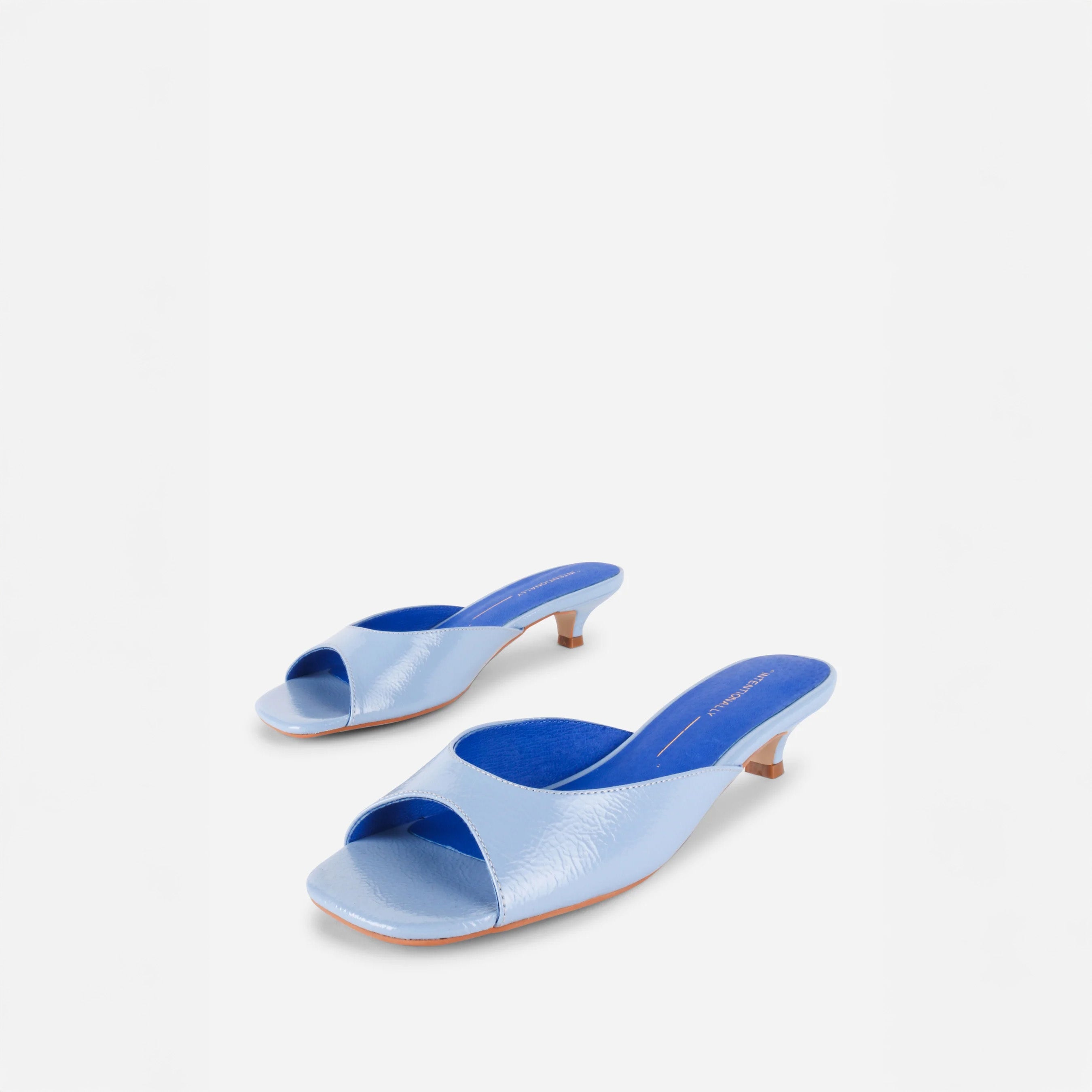 INTENTIONALLY __________. Cee Kitten Heel Mule - Light Blue