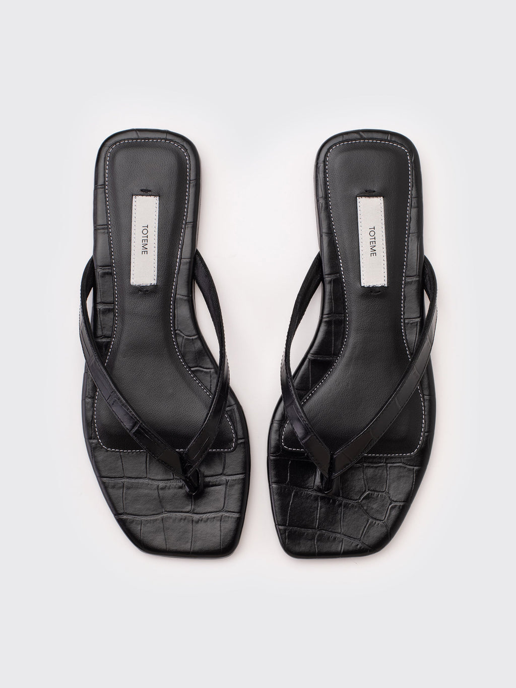 Totême Croco-Embossed Flip Flops - Black