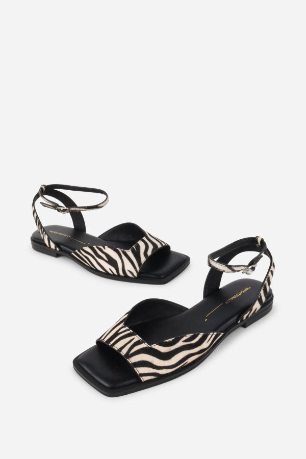 "INTENTIONALLY __________." Dive Cowhide Square Toe Sandal
