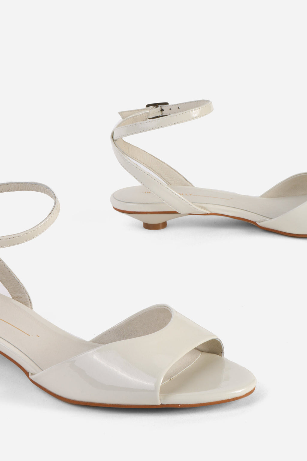INTENTIONALLY __________. Echo Kitten Heel Sandal
